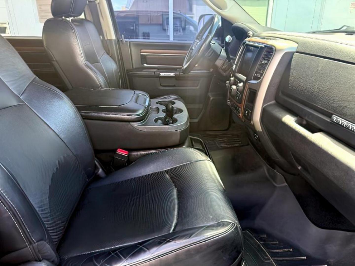 2013 Black Clearcoat /Black Ram 2500 (3C6UR5NL8DG) with an Cummins 67L I-6 diesel direct injection engine, Automatic transmission, located at 1175 N Woodruff Ave, Idaho Falls, ID, 83401, 43.506901, -111.999657 - At Timberline Auto, finding a great deal on your next vehicle is always easy! Our experienced sales staff's goal is to help find you the right vehicle at the right price! Our knowledgeable finance department has options for almost any credit score. We offer extended service contract options to prote - Photo#13