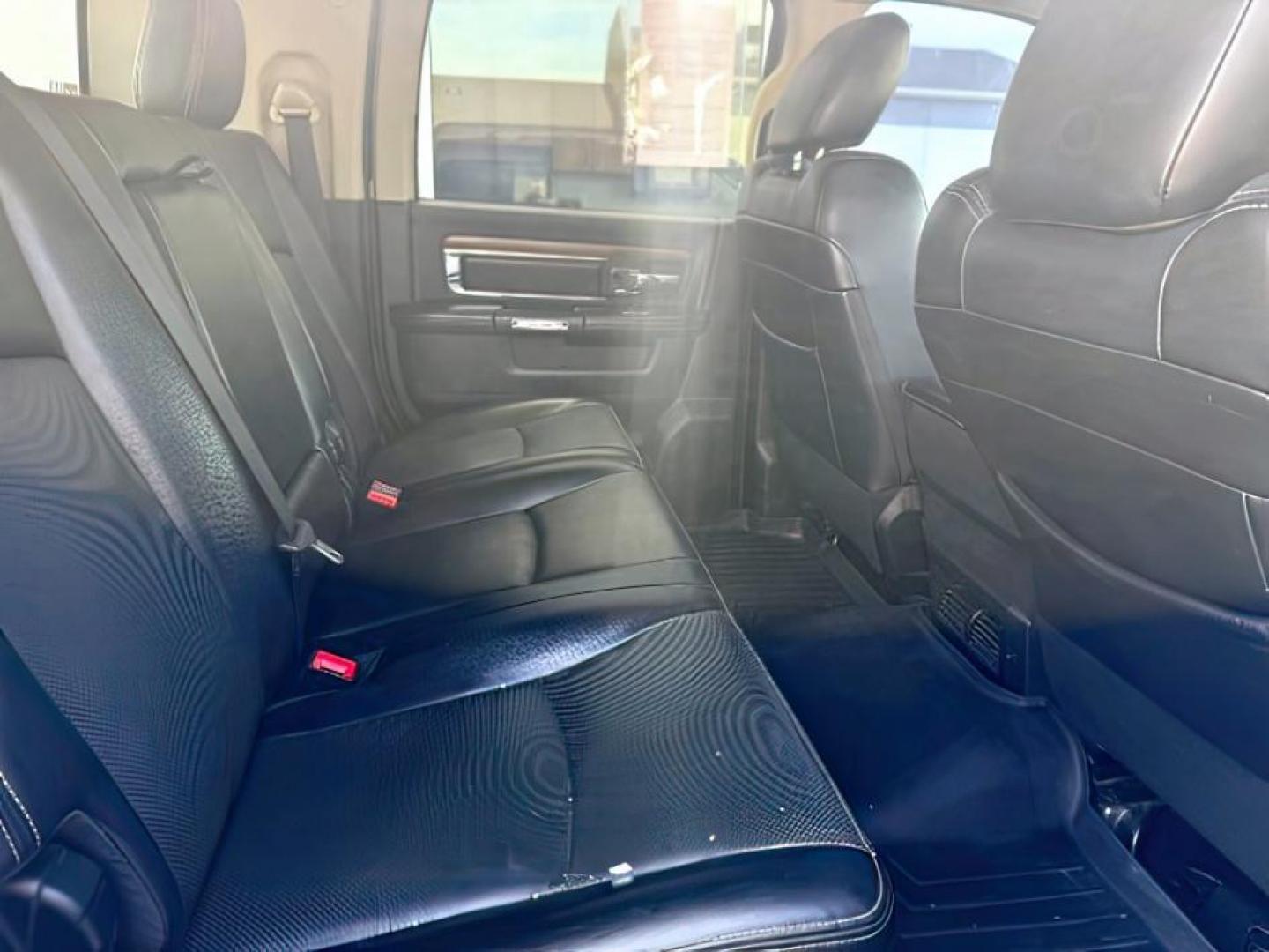 2013 Black Clearcoat /Black Ram 2500 (3C6UR5NL8DG) with an Cummins 67L I-6 diesel direct injection engine, Automatic transmission, located at 1175 N Woodruff Ave, Idaho Falls, ID, 83401, 43.506901, -111.999657 - At Timberline Auto, finding a great deal on your next vehicle is always easy! Our experienced sales staff's goal is to help find you the right vehicle at the right price! Our knowledgeable finance department has options for almost any credit score. We offer extended service contract options to prote - Photo#14