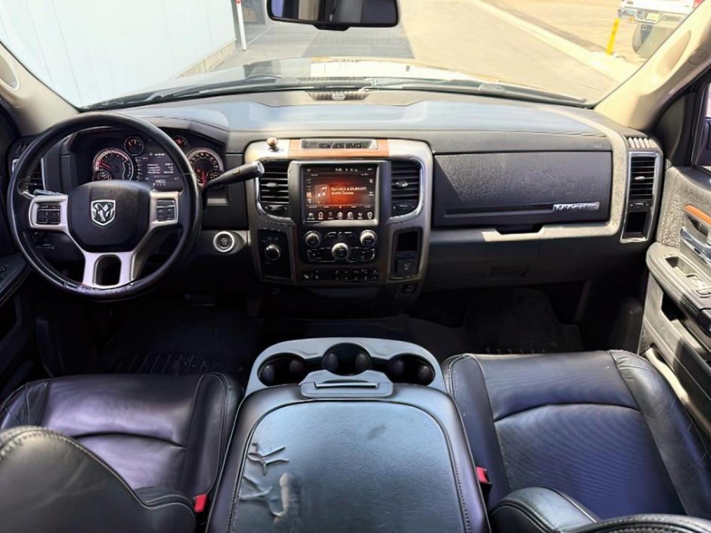 2013 Black Clearcoat /Black Ram 2500 (3C6UR5NL8DG) with an Cummins 67L I-6 diesel direct injection engine, Automatic transmission, located at 1175 N Woodruff Ave, Idaho Falls, ID, 83401, 43.506901, -111.999657 - At Timberline Auto, finding a great deal on your next vehicle is always easy! Our experienced sales staff's goal is to help find you the right vehicle at the right price! Our knowledgeable finance department has options for almost any credit score. We offer extended service contract options to prote - Photo#15