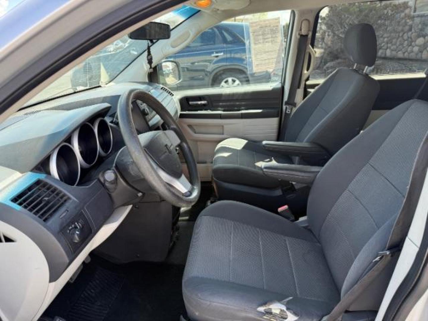 2008 Bright Silver Metallic /Dark Slate/Light Shale Cloth Interior Dodge Grand Caravan SE (2D8HN44H08R) with an 3.3L V6 OHV 12V engine, 4-Speed Automatic transmission, located at 1235 N Woodruff Ave., Idaho Falls, 83401, (208) 523-1053, 43.507172, -112.000488 - At Timberline Auto, finding a great deal on your next vehicle is always easy! Our experienced sales staff's goal is to help find you the right vehicle at the right price! Our knowledgeable finance department has options for almost any credit score. We offer extended service contract options to prote - Photo#21