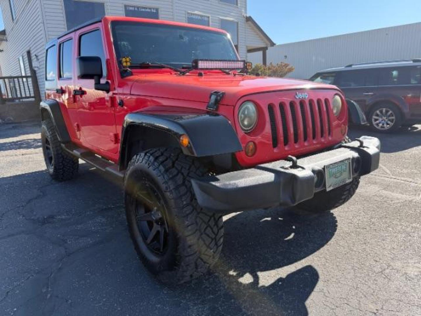 2013 ORANGE /Black Jeep Wrangler Unlimited (1C4BJWDG7DL) with an 36L V-6 DOHC engine, Automatic transmission, located at 1175 N Woodruff Ave, Idaho Falls, ID, 83401, 43.506901, -111.999657 - At Timberline Auto, finding a great deal on your next vehicle is always easy! Our experienced sales staff's goal is to help find you the right vehicle at the right price! Our knowledgeable finance department has options for almost any credit score. We offer extended service contract options to prote - Photo#25