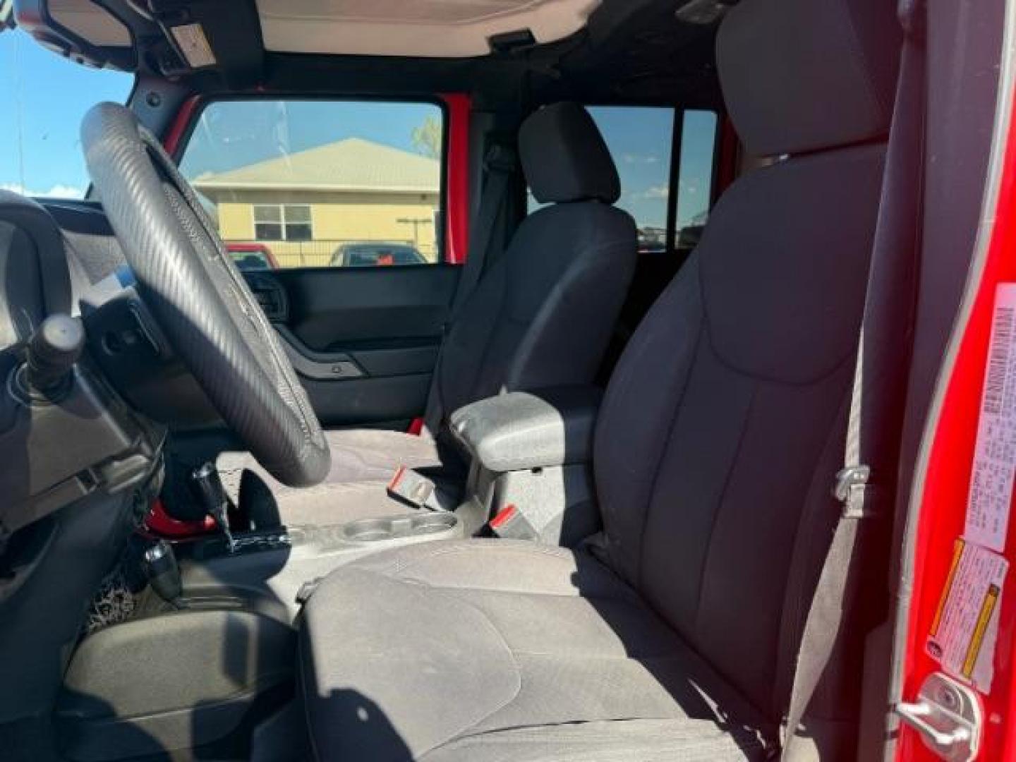 2013 ORANGE /Black Jeep Wrangler Unlimited (1C4BJWDG7DL) with an 36L V-6 DOHC engine, Automatic transmission, located at 1175 N Woodruff Ave, Idaho Falls, ID, 83401, 43.506901, -111.999657 - At Timberline Auto, finding a great deal on your next vehicle is always easy! Our experienced sales staff's goal is to help find you the right vehicle at the right price! Our knowledgeable finance department has options for almost any credit score. We offer extended service contract options to prote - Photo#28