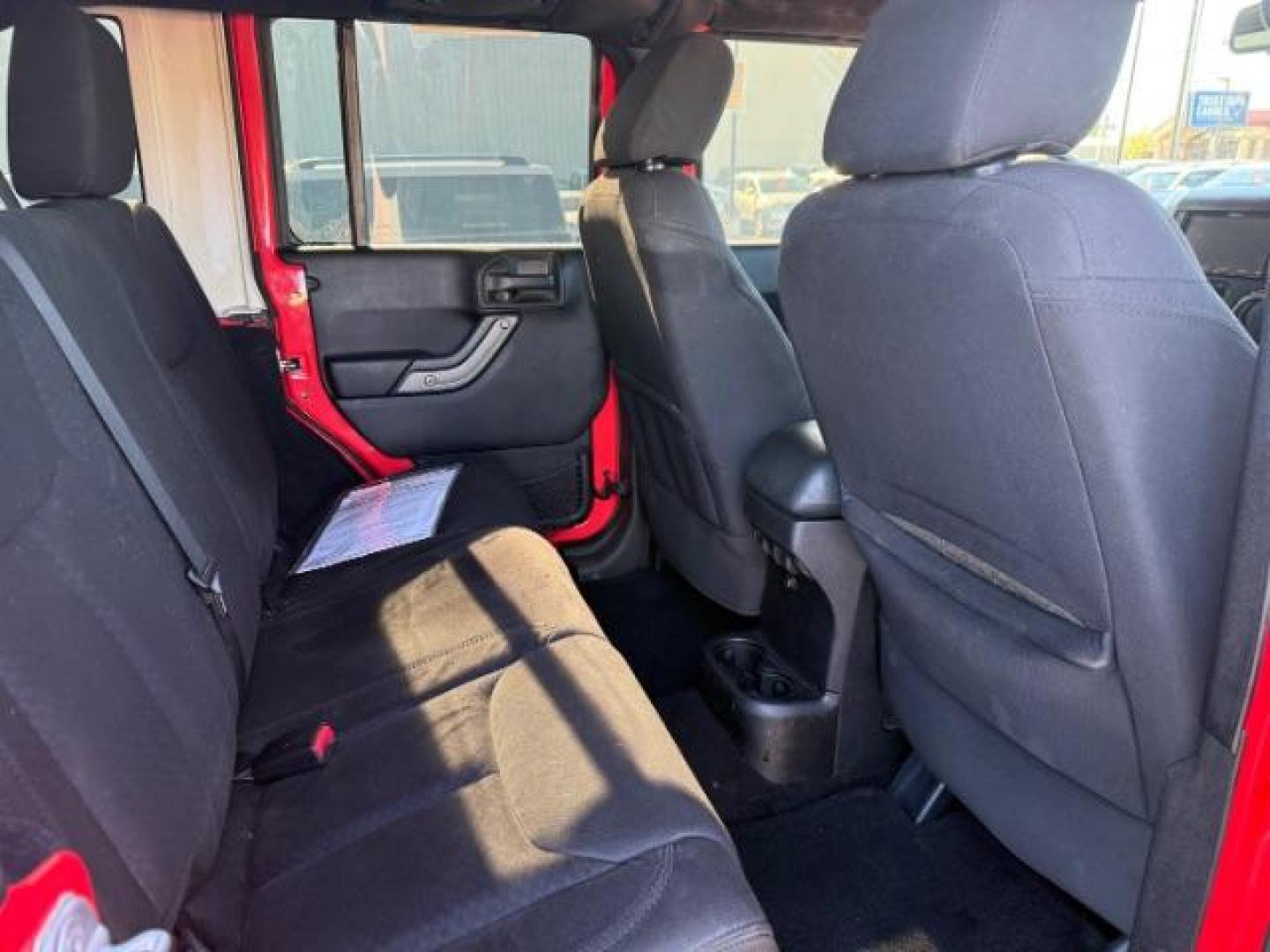 2013 ORANGE /Black Jeep Wrangler Unlimited (1C4BJWDG7DL) with an 36L V-6 DOHC engine, Automatic transmission, located at 1175 N Woodruff Ave, Idaho Falls, ID, 83401, 43.506901, -111.999657 - At Timberline Auto, finding a great deal on your next vehicle is always easy! Our experienced sales staff's goal is to help find you the right vehicle at the right price! Our knowledgeable finance department has options for almost any credit score. We offer extended service contract options to prote - Photo#31