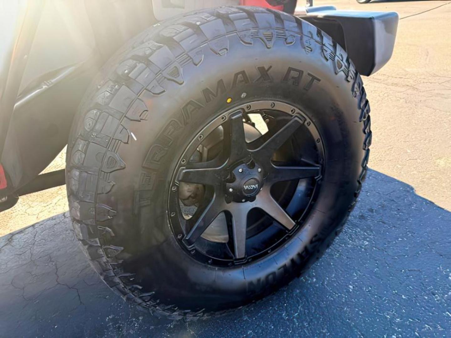 2013 ORANGE /Black Jeep Wrangler Unlimited (1C4BJWDG7DL) with an 36L V-6 DOHC engine, Automatic transmission, located at 1175 N Woodruff Ave, Idaho Falls, ID, 83401, 43.506901, -111.999657 - At Timberline Auto, finding a great deal on your next vehicle is always easy! Our experienced sales staff's goal is to help find you the right vehicle at the right price! Our knowledgeable finance department has options for almost any credit score. We offer extended service contract options to prote - Photo#7