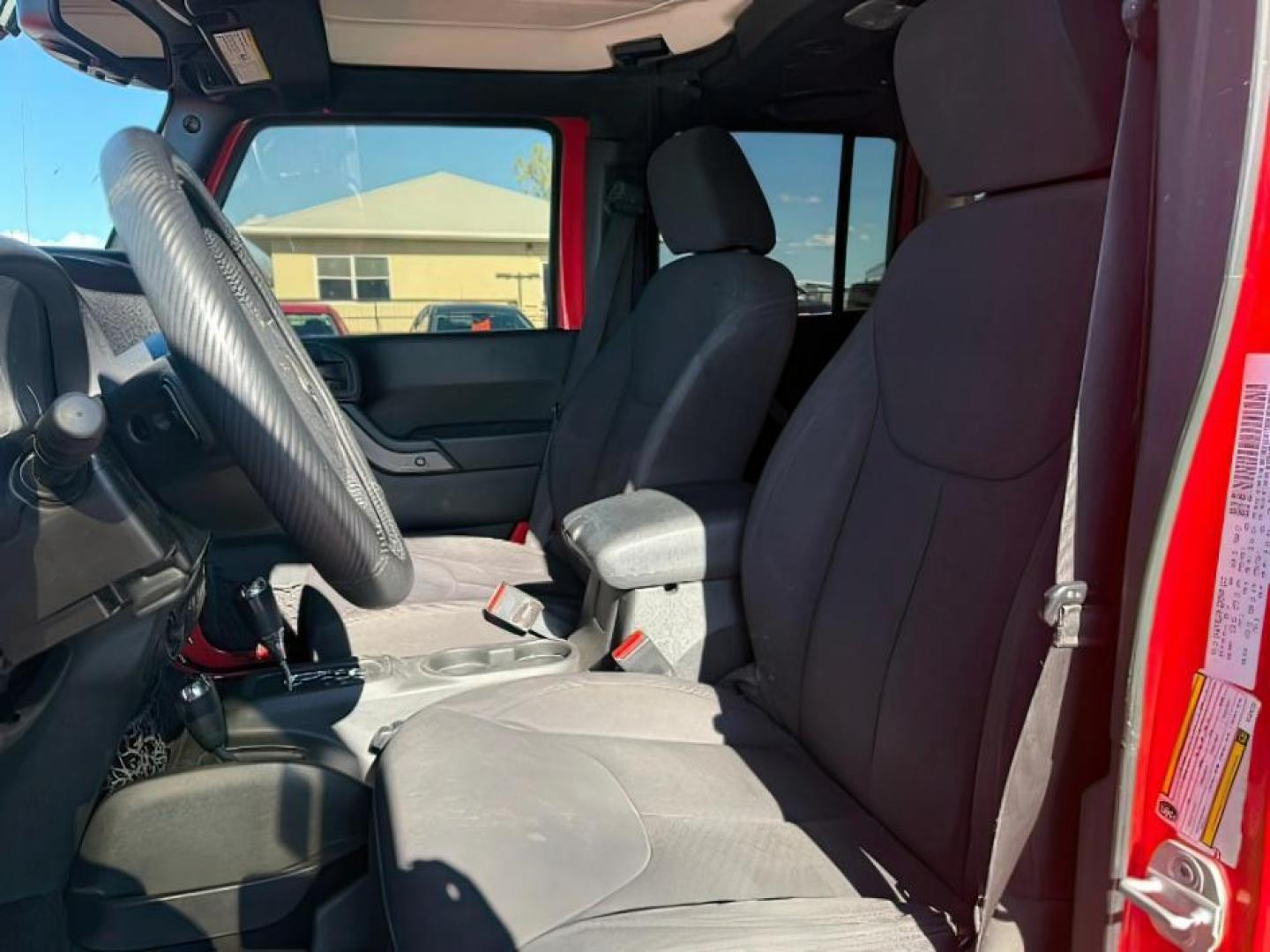 2013 ORANGE /Black Jeep Wrangler Unlimited (1C4BJWDG7DL) with an 36L V-6 DOHC engine, Automatic transmission, located at 1175 N Woodruff Ave, Idaho Falls, ID, 83401, 43.506901, -111.999657 - At Timberline Auto, finding a great deal on your next vehicle is always easy! Our experienced sales staff's goal is to help find you the right vehicle at the right price! Our knowledgeable finance department has options for almost any credit score. We offer extended service contract options to prote - Photo#8