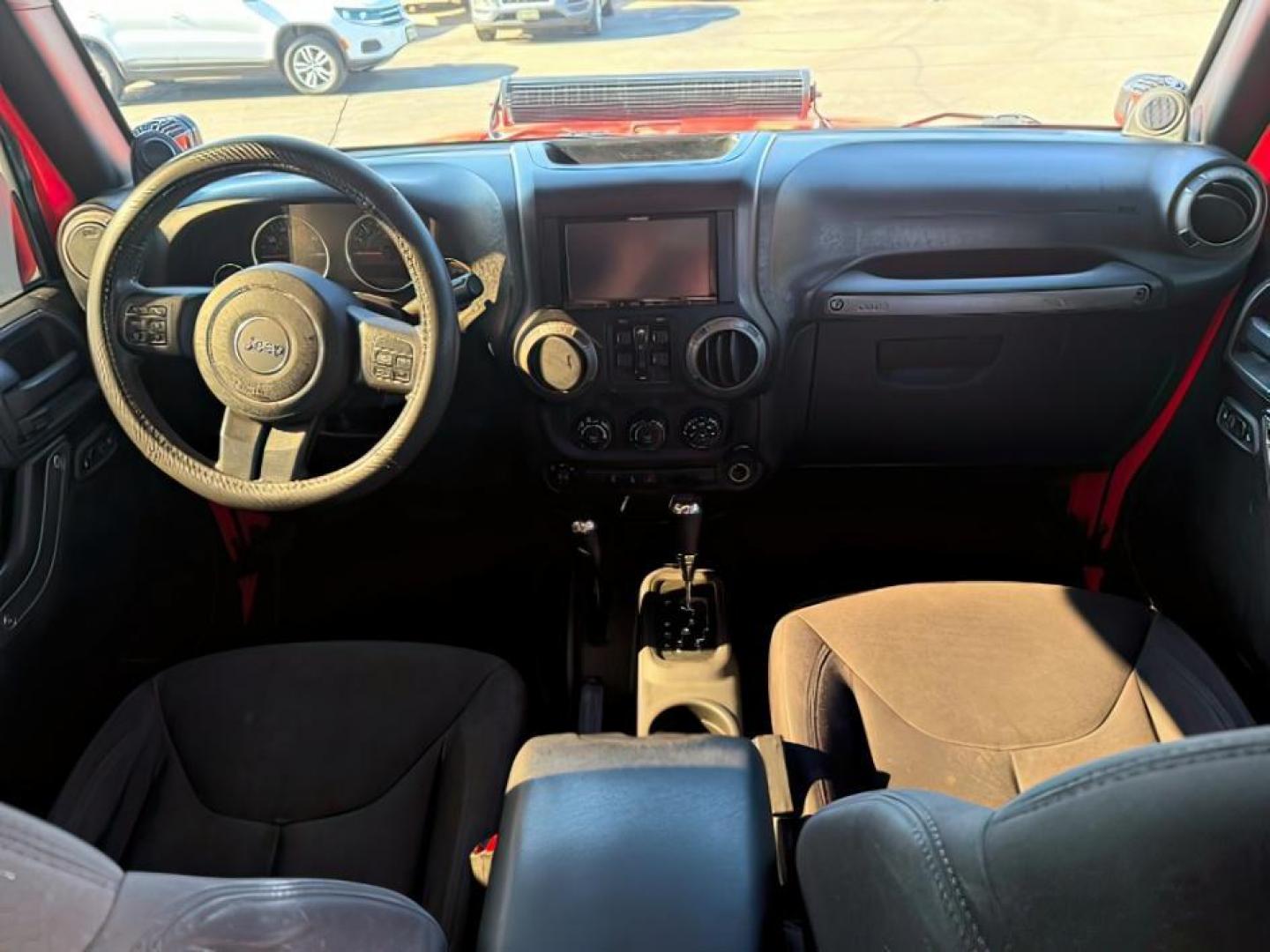 2013 ORANGE /Black Jeep Wrangler Unlimited (1C4BJWDG7DL) with an 36L V-6 DOHC engine, Automatic transmission, located at 1175 N Woodruff Ave, Idaho Falls, ID, 83401, 43.506901, -111.999657 - At Timberline Auto, finding a great deal on your next vehicle is always easy! Our experienced sales staff's goal is to help find you the right vehicle at the right price! Our knowledgeable finance department has options for almost any credit score. We offer extended service contract options to prote - Photo#13