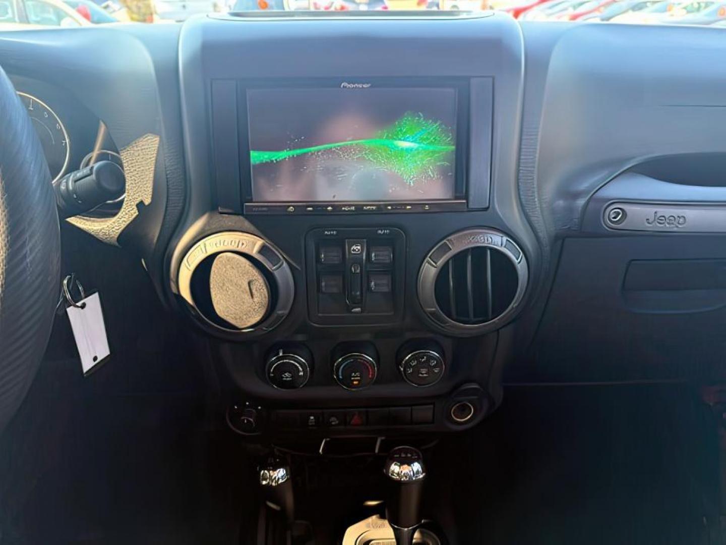2013 ORANGE /Black Jeep Wrangler Unlimited (1C4BJWDG7DL) with an 36L V-6 DOHC engine, Automatic transmission, located at 1175 N Woodruff Ave, Idaho Falls, ID, 83401, 43.506901, -111.999657 - At Timberline Auto, finding a great deal on your next vehicle is always easy! Our experienced sales staff's goal is to help find you the right vehicle at the right price! Our knowledgeable finance department has options for almost any credit score. We offer extended service contract options to prote - Photo#14