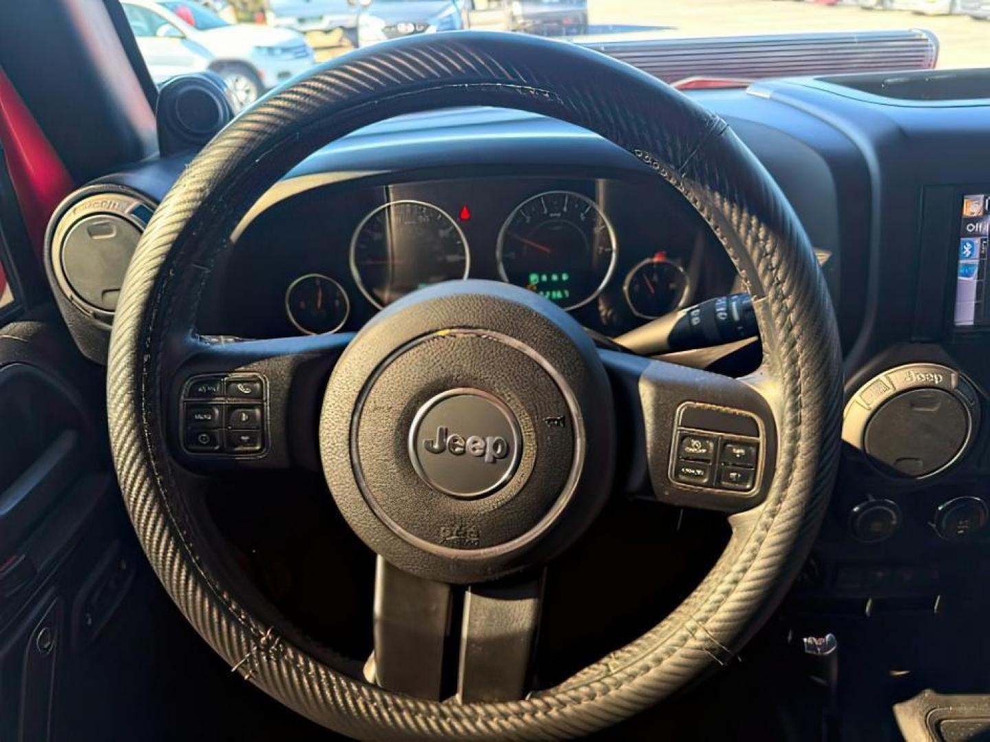 2013 ORANGE /Black Jeep Wrangler Unlimited (1C4BJWDG7DL) with an 36L V-6 DOHC engine, Automatic transmission, located at 1175 N Woodruff Ave, Idaho Falls, ID, 83401, 43.506901, -111.999657 - At Timberline Auto, finding a great deal on your next vehicle is always easy! Our experienced sales staff's goal is to help find you the right vehicle at the right price! Our knowledgeable finance department has options for almost any credit score. We offer extended service contract options to prote - Photo#16