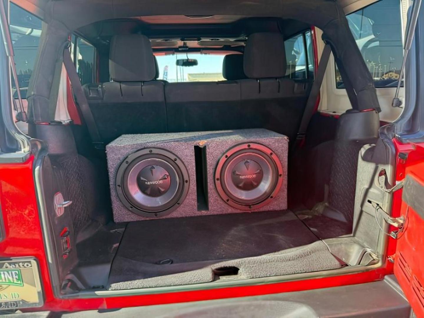 2013 ORANGE /Black Jeep Wrangler Unlimited (1C4BJWDG7DL) with an 36L V-6 DOHC engine, Automatic transmission, located at 1175 N Woodruff Ave, Idaho Falls, ID, 83401, 43.506901, -111.999657 - At Timberline Auto, finding a great deal on your next vehicle is always easy! Our experienced sales staff's goal is to help find you the right vehicle at the right price! Our knowledgeable finance department has options for almost any credit score. We offer extended service contract options to prote - Photo#19