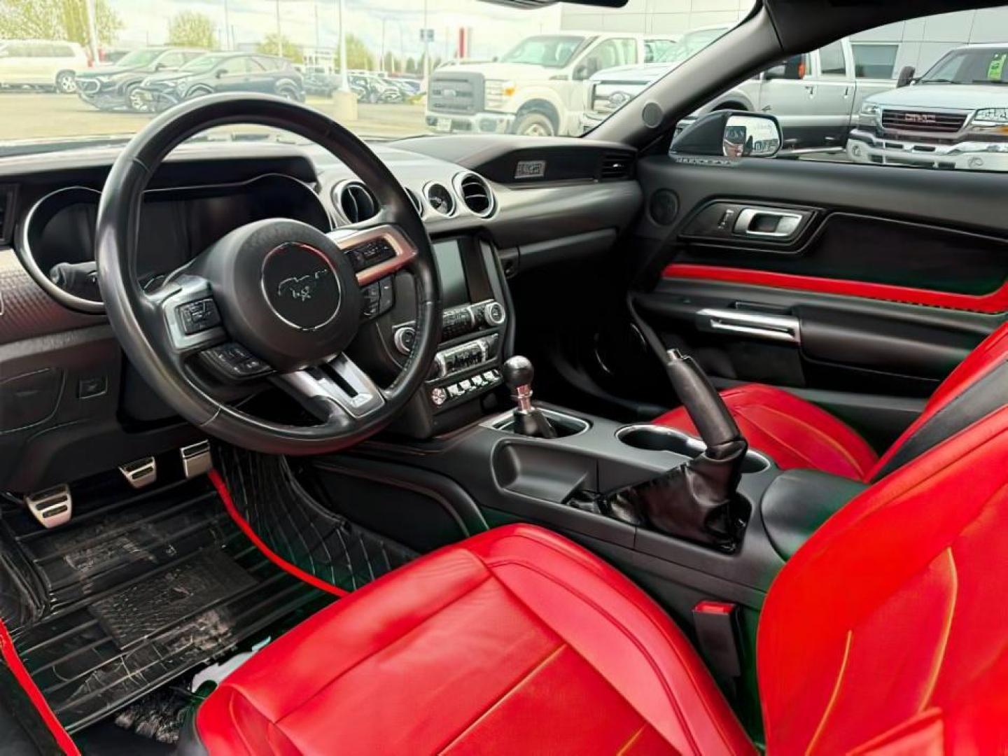 2020 Shadow Black /Show Stopper Red Ford Mustang (1FA6P8TD2L5) with an EcoBoost 23L I-4 gasoline direct injection engine, Manual transmission, located at 1175 N Woodruff Ave, Idaho Falls, ID, 83401, 43.506901, -111.999657 - At Timberline Auto, finding a great deal on your next vehicle is always easy! Our experienced sales staff's goal is to help find you the right vehicle at the right price! Our knowledgeable finance department has options for almost any credit score. We offer extended service contract options to prote - Photo#9