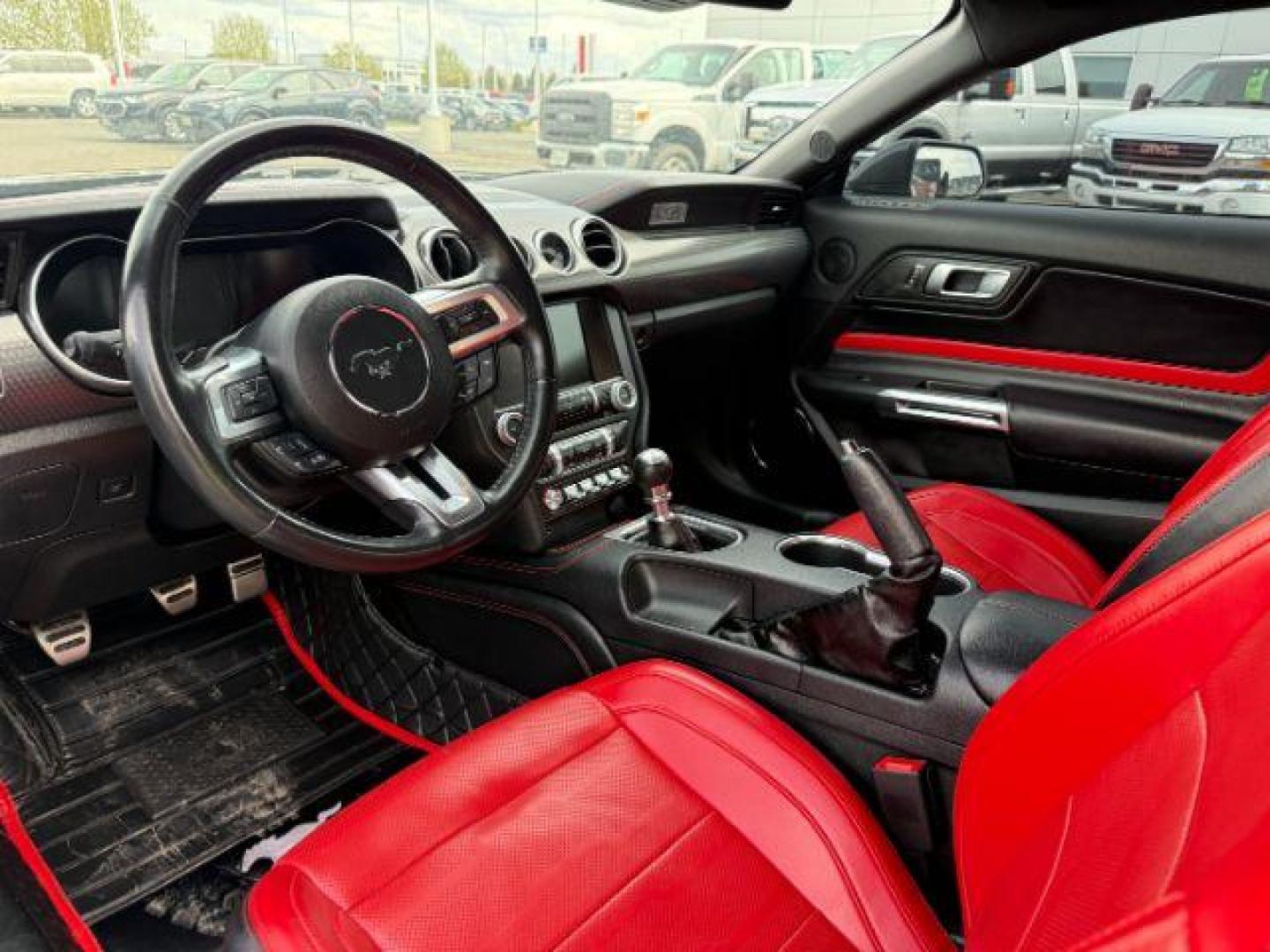 2020 Shadow Black /Show Stopper Red Ford Mustang EcoBoost Premium Fastback (1FA6P8TD2L5) with an EcoBoost 2.3L I-4 gasoline direct injection engine, MANUAL transmission, located at 1235 N Woodruff Ave., Idaho Falls, 83401, (208) 523-1053, 43.507172, -112.000488 - At Timberline Auto, finding a great deal on your next vehicle is always easy! Our experienced sales staff's goal is to help find you the right vehicle at the right price! Our knowledgeable finance department has options for almost any credit score. We offer extended service contract options to prote - Photo#9