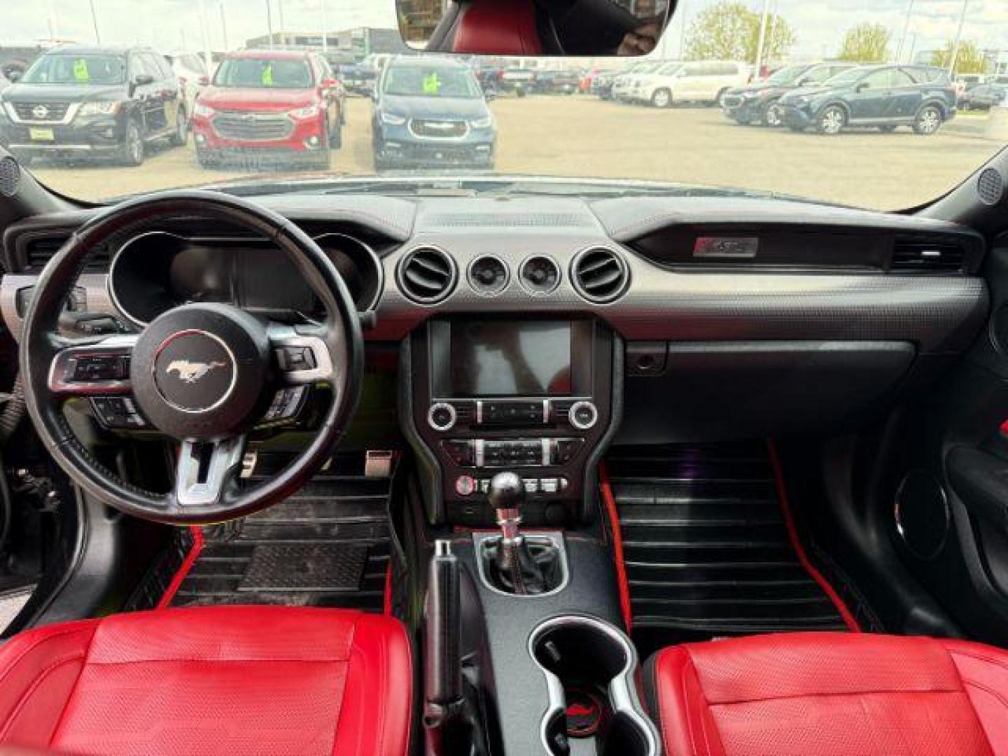 2020 Shadow Black /Show Stopper Red Ford Mustang EcoBoost Premium Fastback (1FA6P8TD2L5) with an EcoBoost 2.3L I-4 gasoline direct injection engine, MANUAL transmission, located at 1235 N Woodruff Ave., Idaho Falls, 83401, (208) 523-1053, 43.507172, -112.000488 - At Timberline Auto, finding a great deal on your next vehicle is always easy! Our experienced sales staff's goal is to help find you the right vehicle at the right price! Our knowledgeable finance department has options for almost any credit score. We offer extended service contract options to prote - Photo#15