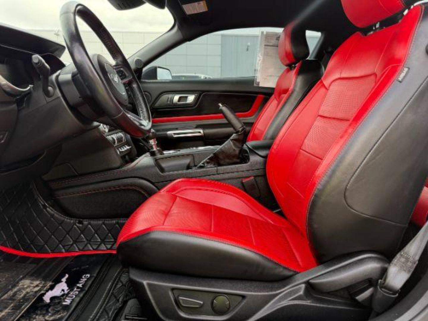 2020 Shadow Black /Show Stopper Red Ford Mustang EcoBoost Premium Fastback (1FA6P8TD2L5) with an EcoBoost 2.3L I-4 gasoline direct injection engine, MANUAL transmission, located at 1235 N Woodruff Ave., Idaho Falls, 83401, (208) 523-1053, 43.507172, -112.000488 - At Timberline Auto, finding a great deal on your next vehicle is always easy! Our experienced sales staff's goal is to help find you the right vehicle at the right price! Our knowledgeable finance department has options for almost any credit score. We offer extended service contract options to prote - Photo#8