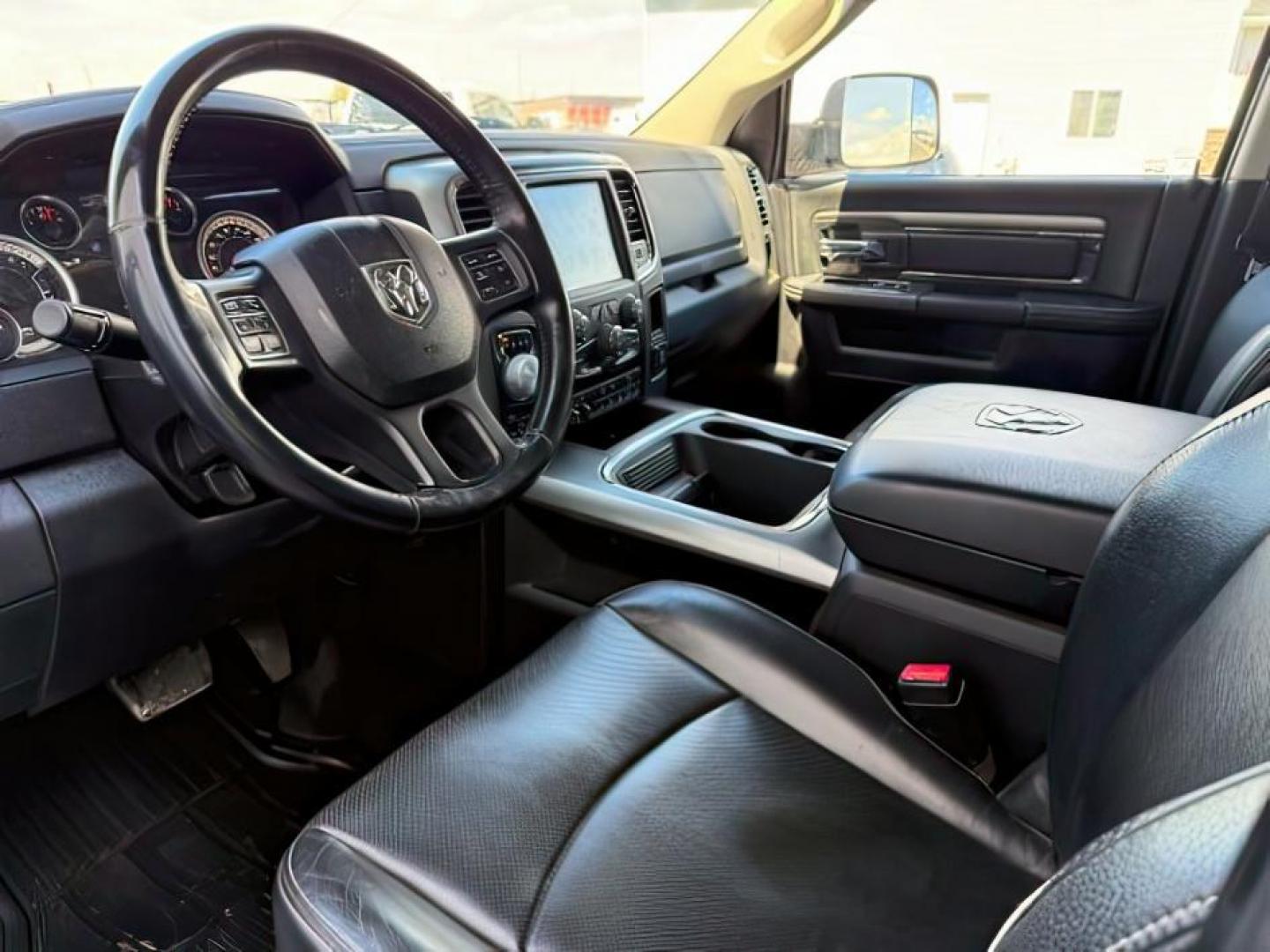 2016 WHITE /LEATHER RAM 1500 LARAMIE (1C6RR7MT9GS) with an 5.7 engine, AUTOMATIC transmission, located at 1235 N Woodruff Ave., Idaho Falls, 83401, (208) 523-1053, 43.507172, -112.000488 - At Timberline Auto, finding a great deal on your next vehicle is always easy! Our experienced sales staff's goal is to help find you the right vehicle at the right price! Our knowledgeable finance department has options for almost any credit score. We offer extended service contract options to prote - Photo#9