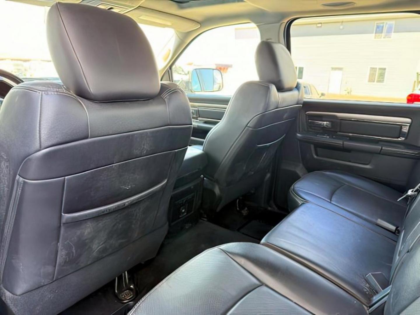 2016 WHITE /LEATHER RAM 1500 LARAMIE (1C6RR7MT9GS) with an 5.7 engine, AUTOMATIC transmission, located at 1235 N Woodruff Ave., Idaho Falls, 83401, (208) 523-1053, 43.507172, -112.000488 - At Timberline Auto, finding a great deal on your next vehicle is always easy! Our experienced sales staff's goal is to help find you the right vehicle at the right price! Our knowledgeable finance department has options for almost any credit score. We offer extended service contract options to prote - Photo#17