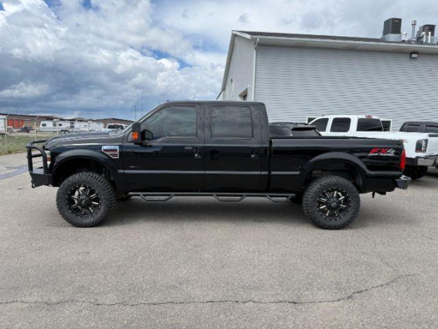 2008 BLACK /LEATHER Ford F-250 LARIAT (1FTSW21R68E) with an 6.4l engine, AUTOMATIC transmission, located at 1235 N Woodruff Ave., Idaho Falls, 83401, (208) 523-1053, 43.507172, -112.000488 - At Timberline Auto, finding a great deal on your next vehicle is always easy! Our experienced sales staff's goal is to help find you the right vehicle at the right price! Our knowledgeable finance department has options for almost any credit score. We offer extended service contract options to prote - Photo#1