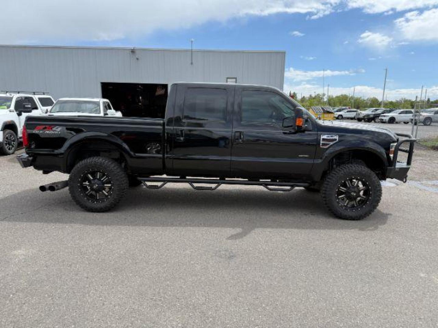 2008 BLACK /LEATHER Ford F-250 LARIAT (1FTSW21R68E) with an 6.4l engine, AUTOMATIC transmission, located at 1235 N Woodruff Ave., Idaho Falls, 83401, (208) 523-1053, 43.507172, -112.000488 - At Timberline Auto, finding a great deal on your next vehicle is always easy! Our experienced sales staff's goal is to help find you the right vehicle at the right price! Our knowledgeable finance department has options for almost any credit score. We offer extended service contract options to prote - Photo#5
