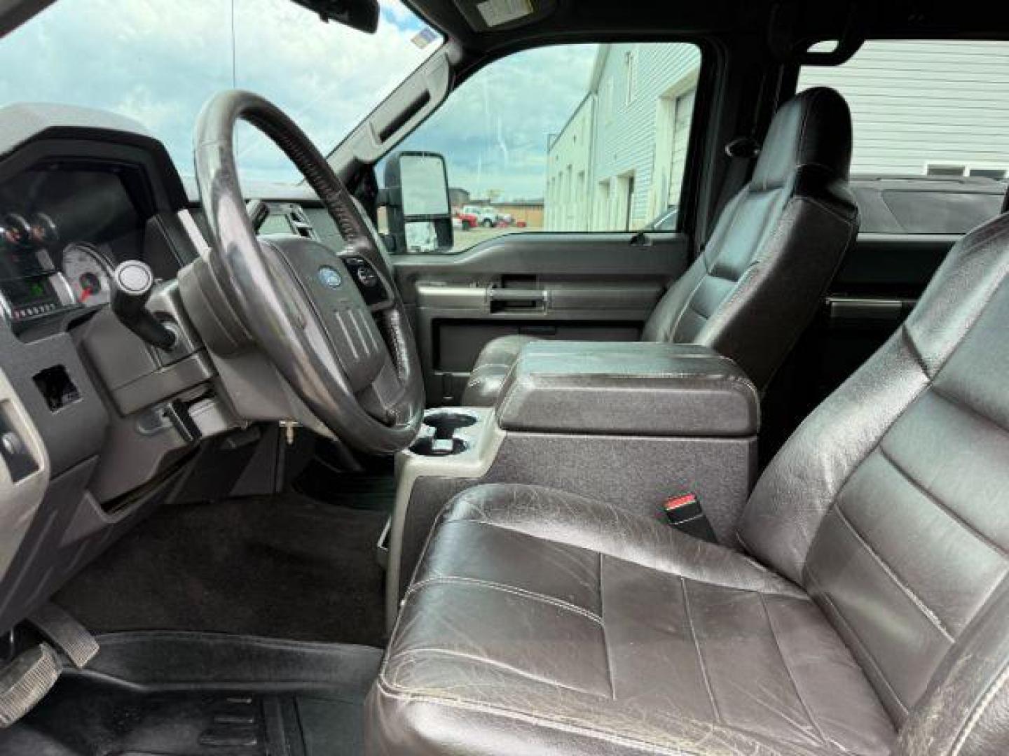 2008 BLACK /LEATHER Ford F-250 LARIAT (1FTSW21R68E) with an 6.4l engine, AUTOMATIC transmission, located at 1235 N Woodruff Ave., Idaho Falls, 83401, (208) 523-1053, 43.507172, -112.000488 - At Timberline Auto, finding a great deal on your next vehicle is always easy! Our experienced sales staff's goal is to help find you the right vehicle at the right price! Our knowledgeable finance department has options for almost any credit score. We offer extended service contract options to prote - Photo#9