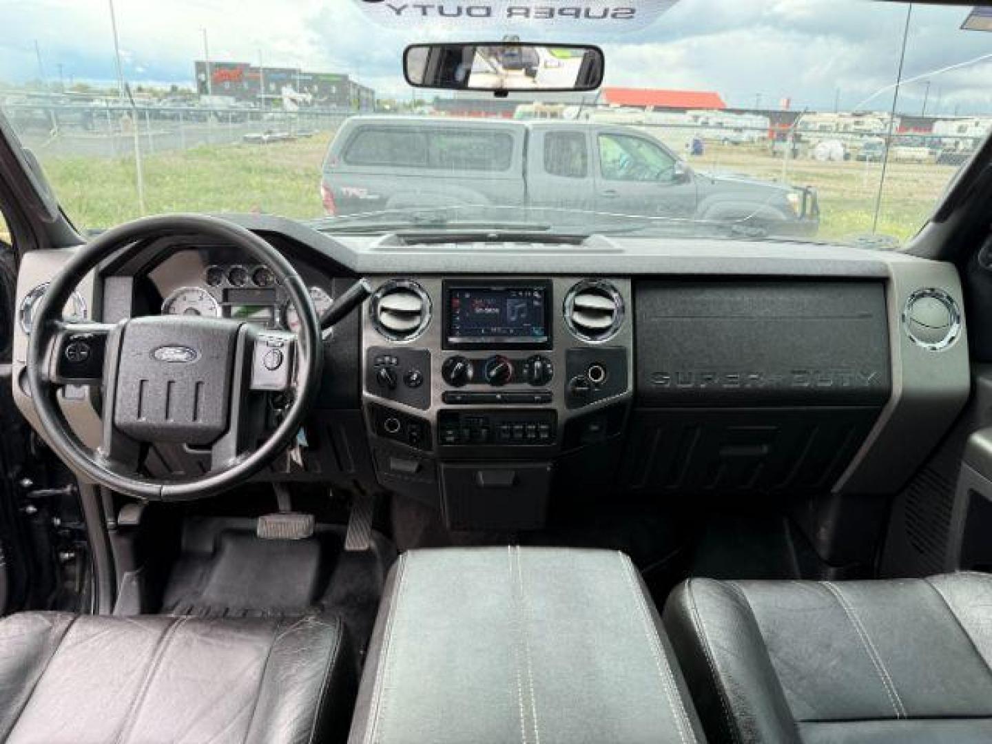 2008 BLACK /LEATHER Ford F-250 LARIAT (1FTSW21R68E) with an 6.4l engine, AUTOMATIC transmission, located at 1235 N Woodruff Ave., Idaho Falls, 83401, (208) 523-1053, 43.507172, -112.000488 - At Timberline Auto, finding a great deal on your next vehicle is always easy! Our experienced sales staff's goal is to help find you the right vehicle at the right price! Our knowledgeable finance department has options for almost any credit score. We offer extended service contract options to prote - Photo#15