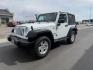 2017 Bright White Clearcoat /Black Jeep Wrangler Sport 4x4 (1C4GJWAG3HL) with an Pentastar 3.6L V-6 DOHC engine, AUTOMATIC transmission, located at 1235 N Woodruff Ave., Idaho Falls, 83401, (208) 523-1053, 43.507172, -112.000488 - At Timberline Auto, finding a great deal on your next vehicle is always easy! Our experienced sales staff's goal is to help find you the right vehicle at the right price! Our knowledgeable finance department has options for almost any credit score. We offer extended service contract options to prote - Photo#0