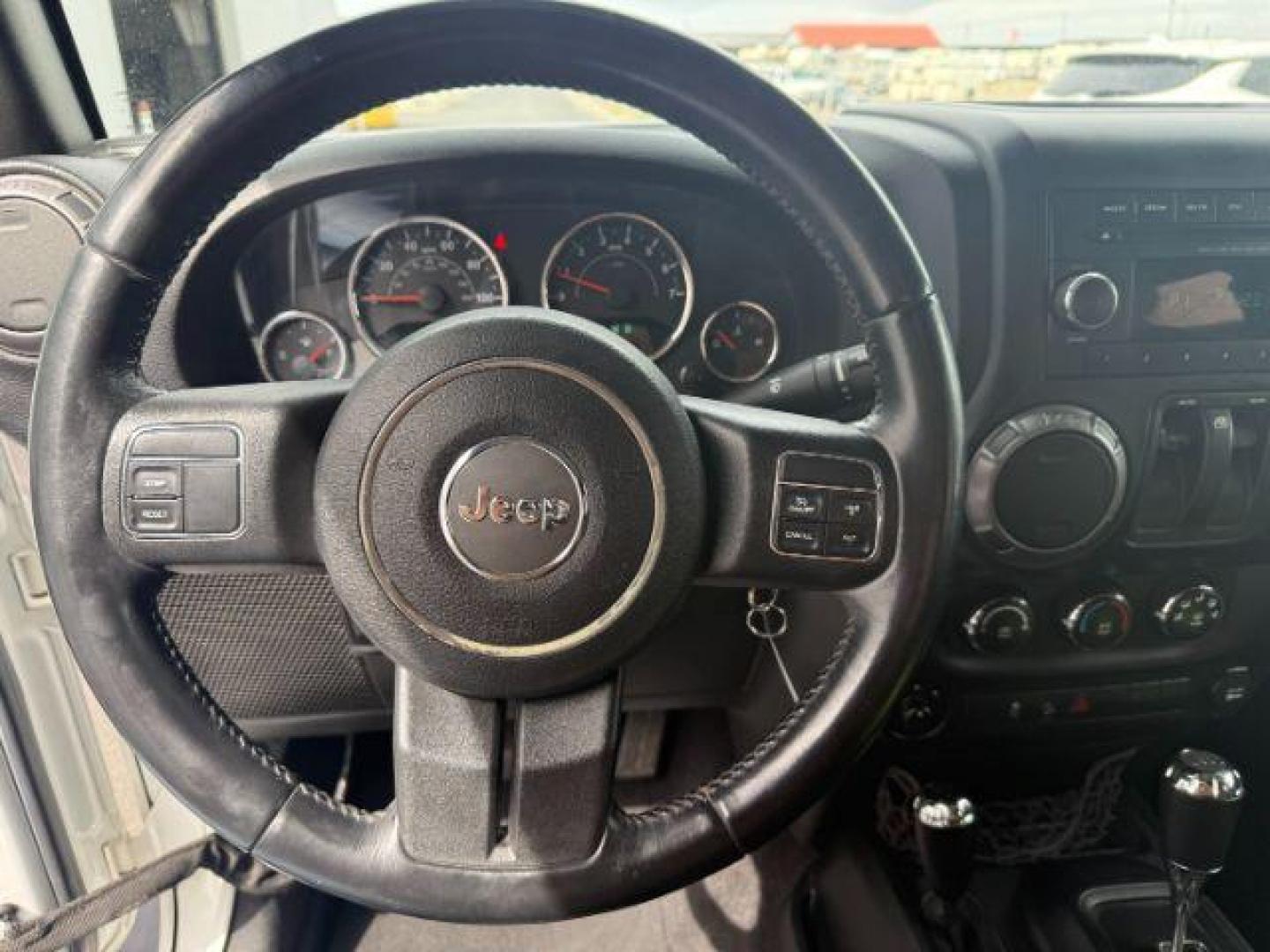 2017 Bright White Clearcoat /Black Jeep Wrangler Sport 4x4 (1C4GJWAG3HL) with an Pentastar 3.6L V-6 DOHC engine, AUTOMATIC transmission, located at 1235 N Woodruff Ave., Idaho Falls, 83401, (208) 523-1053, 43.507172, -112.000488 - At Timberline Auto, finding a great deal on your next vehicle is always easy! Our experienced sales staff's goal is to help find you the right vehicle at the right price! Our knowledgeable finance department has options for almost any credit score. We offer extended service contract options to prote - Photo#12