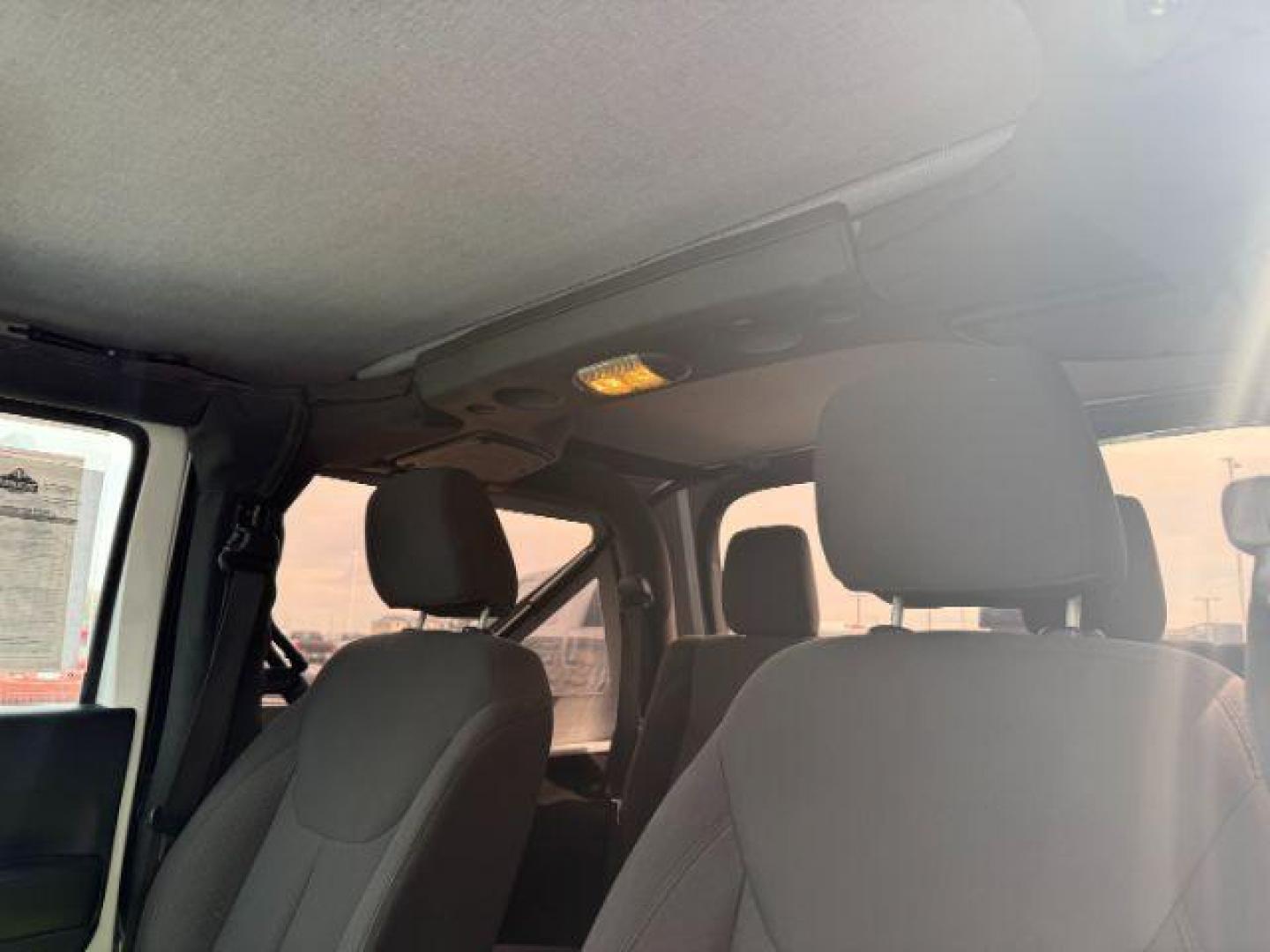 2017 Bright White Clearcoat /Black Jeep Wrangler Sport 4x4 (1C4GJWAG3HL) with an Pentastar 3.6L V-6 DOHC engine, AUTOMATIC transmission, located at 1235 N Woodruff Ave., Idaho Falls, 83401, (208) 523-1053, 43.507172, -112.000488 - At Timberline Auto, finding a great deal on your next vehicle is always easy! Our experienced sales staff's goal is to help find you the right vehicle at the right price! Our knowledgeable finance department has options for almost any credit score. We offer extended service contract options to prote - Photo#14