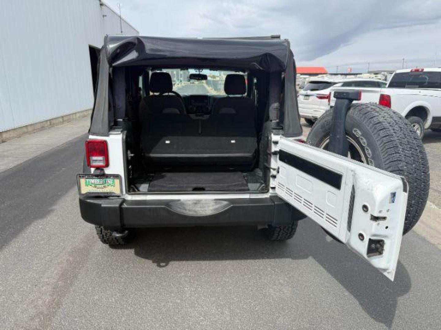 2017 Bright White Clearcoat /Black Jeep Wrangler Sport 4x4 (1C4GJWAG3HL) with an Pentastar 3.6L V-6 DOHC engine, AUTOMATIC transmission, located at 1235 N Woodruff Ave., Idaho Falls, 83401, (208) 523-1053, 43.507172, -112.000488 - At Timberline Auto, finding a great deal on your next vehicle is always easy! Our experienced sales staff's goal is to help find you the right vehicle at the right price! Our knowledgeable finance department has options for almost any credit score. We offer extended service contract options to prote - Photo#4