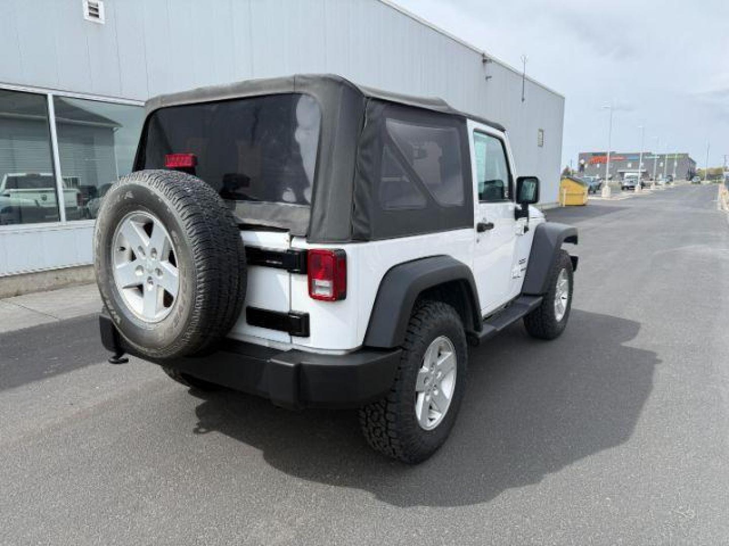 2017 Bright White Clearcoat /Black Jeep Wrangler Sport 4x4 (1C4GJWAG3HL) with an Pentastar 3.6L V-6 DOHC engine, AUTOMATIC transmission, located at 1235 N Woodruff Ave., Idaho Falls, 83401, (208) 523-1053, 43.507172, -112.000488 - At Timberline Auto, finding a great deal on your next vehicle is always easy! Our experienced sales staff's goal is to help find you the right vehicle at the right price! Our knowledgeable finance department has options for almost any credit score. We offer extended service contract options to prote - Photo#5