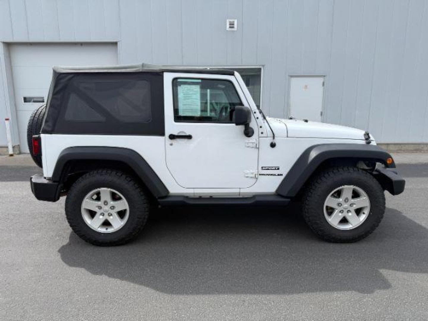 2017 Bright White Clearcoat /Black Jeep Wrangler Sport 4x4 (1C4GJWAG3HL) with an Pentastar 3.6L V-6 DOHC engine, AUTOMATIC transmission, located at 1235 N Woodruff Ave., Idaho Falls, 83401, (208) 523-1053, 43.507172, -112.000488 - At Timberline Auto, finding a great deal on your next vehicle is always easy! Our experienced sales staff's goal is to help find you the right vehicle at the right price! Our knowledgeable finance department has options for almost any credit score. We offer extended service contract options to prote - Photo#6