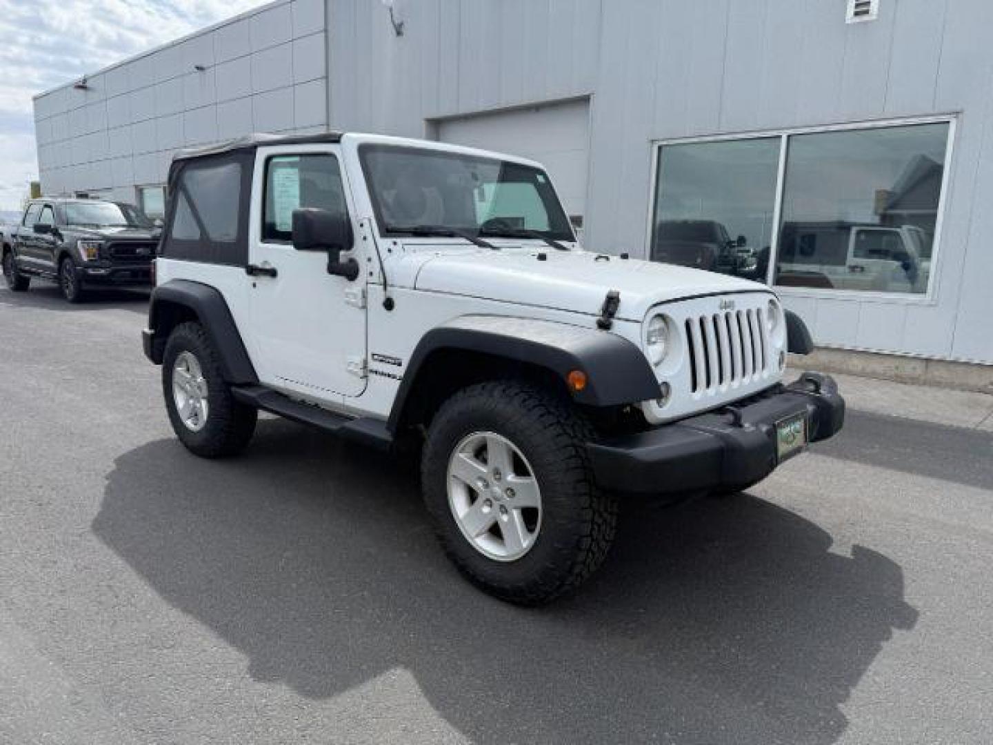 2017 Bright White Clearcoat /Black Jeep Wrangler Sport 4x4 (1C4GJWAG3HL) with an Pentastar 3.6L V-6 DOHC engine, AUTOMATIC transmission, located at 1235 N Woodruff Ave., Idaho Falls, 83401, (208) 523-1053, 43.507172, -112.000488 - At Timberline Auto, finding a great deal on your next vehicle is always easy! Our experienced sales staff's goal is to help find you the right vehicle at the right price! Our knowledgeable finance department has options for almost any credit score. We offer extended service contract options to prote - Photo#7