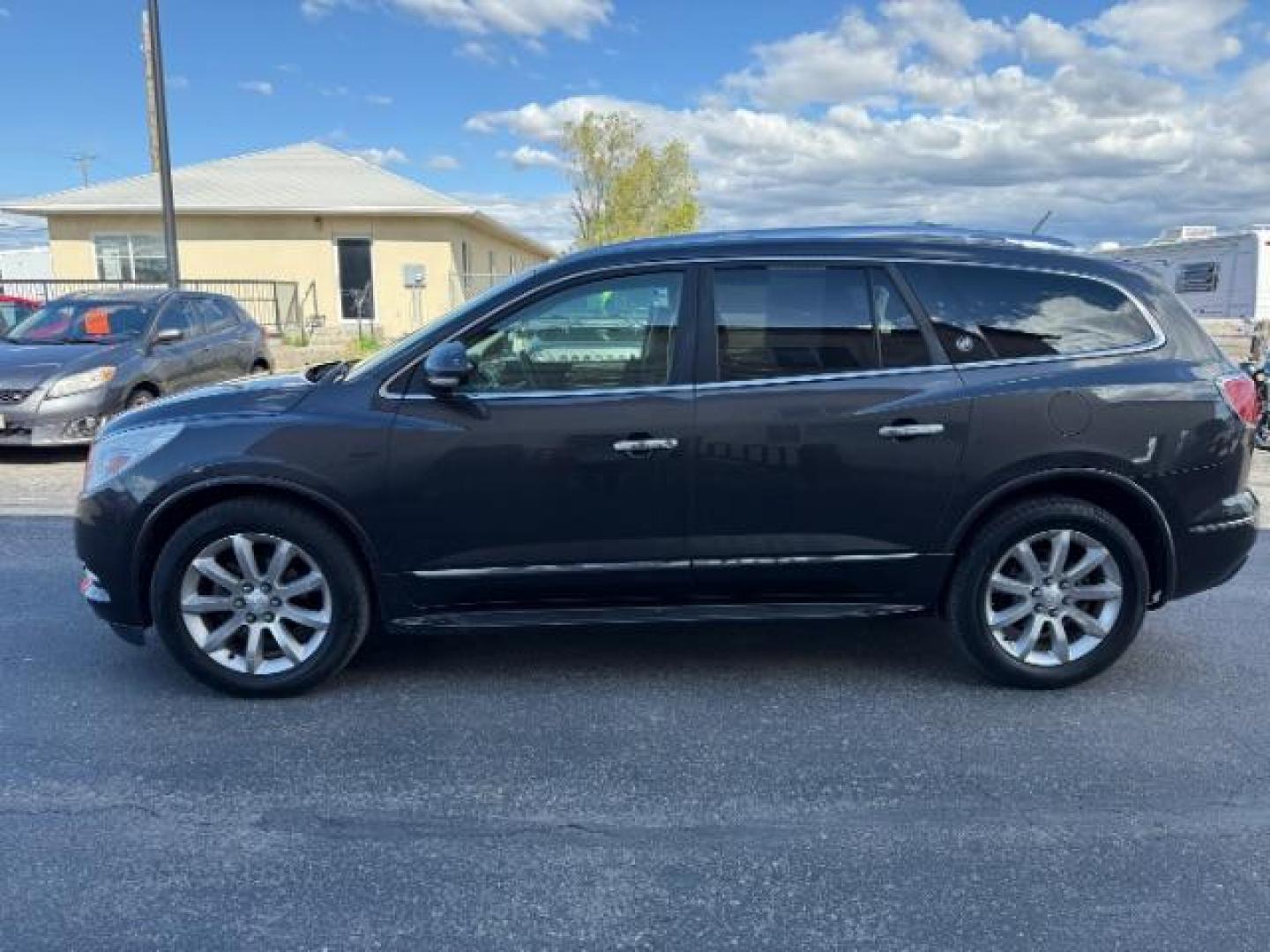 2014 Iridium Metallic /Ebony Buick Enclave Premium (5GAKVCKD2EJ) with an 3.6L V-6 gasoline direct injection engine, AUTOMATIC transmission, located at 1235 N Woodruff Ave., Idaho Falls, 83401, (208) 523-1053, 43.507172, -112.000488 - At Timberline Auto, finding a great deal on your next vehicle is always easy! Our experienced sales staff's goal is to help find you the right vehicle at the right price! Our knowledgeable finance department has options for almost any credit score. We offer extended service contract options to prote - Photo#1