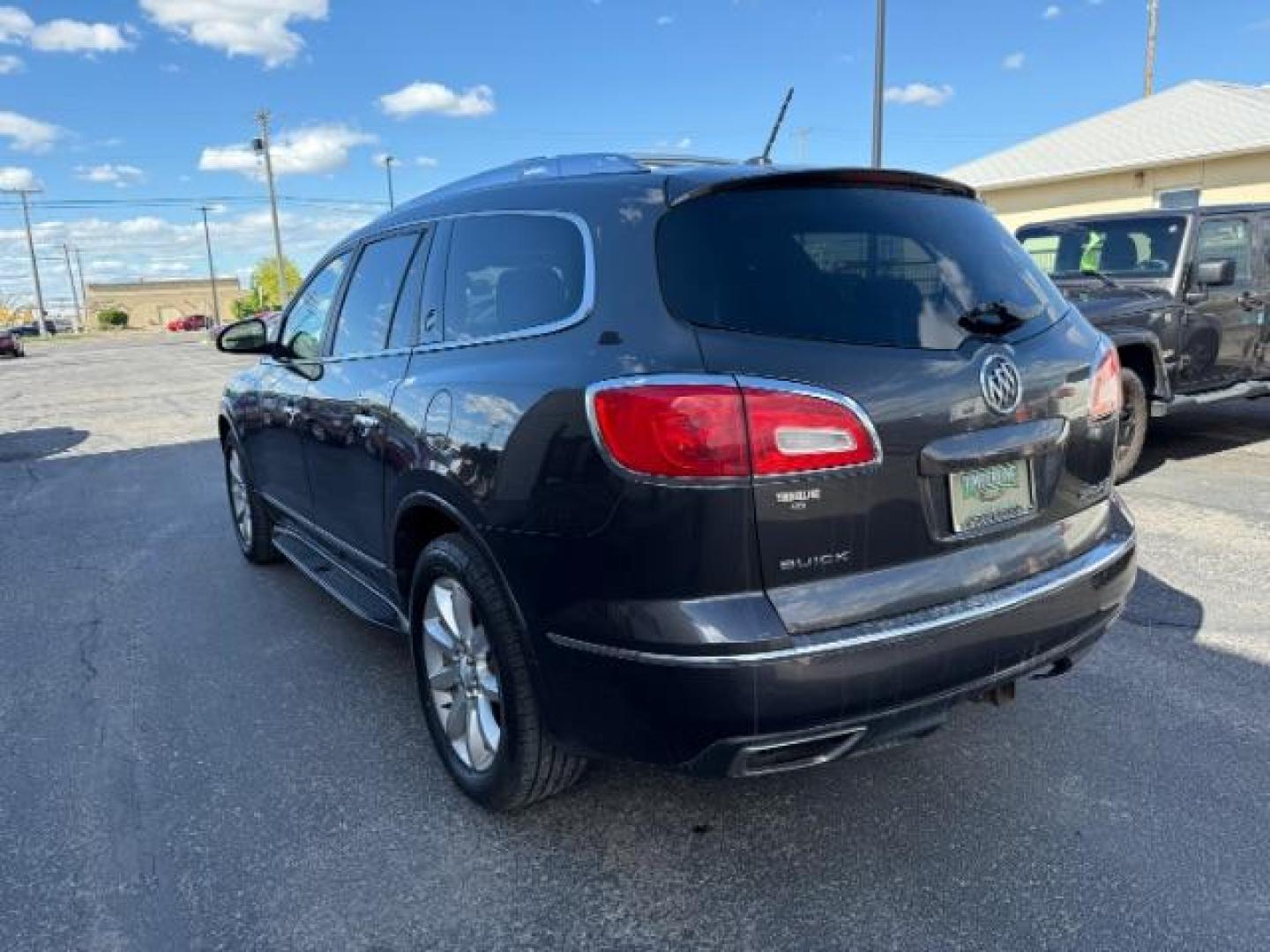 2014 Iridium Metallic /Ebony Buick Enclave Premium (5GAKVCKD2EJ) with an 3.6L V-6 gasoline direct injection engine, AUTOMATIC transmission, located at 1235 N Woodruff Ave., Idaho Falls, 83401, (208) 523-1053, 43.507172, -112.000488 - At Timberline Auto, finding a great deal on your next vehicle is always easy! Our experienced sales staff's goal is to help find you the right vehicle at the right price! Our knowledgeable finance department has options for almost any credit score. We offer extended service contract options to prote - Photo#2