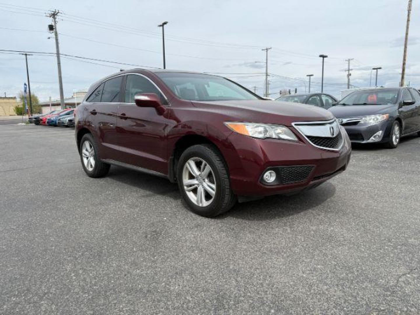 2015 MAROON /GRAY Acura RDX TECH (5J8TB4H51FL) with an 3.5 engine, AUTOMATIC transmission, located at 1235 N Woodruff Ave., Idaho Falls, 83401, (208) 523-1053, 43.507172, -112.000488 - At Timberline Auto, finding a great deal on your next vehicle is always easy! Our experienced sales staff's goal is to help find you the right vehicle at the right price! Our knowledgeable finance department has options for almost any credit score. We offer extended service contract options to prote - Photo#7