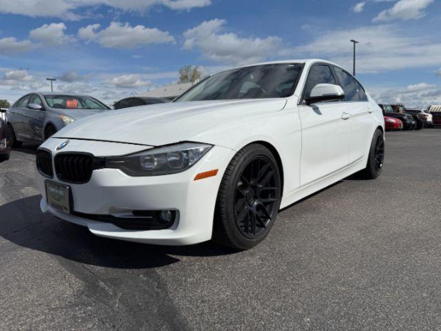 2014 Alpine White /Black BMW 320i xDrive (WBA3C3C51EF) with an 2L I-4 gasoline direct injection engine, AUTOMATIC transmission, located at 1235 N Woodruff Ave., Idaho Falls, 83401, (208) 523-1053, 43.507172, -112.000488 - At Timberline Auto, finding a great deal on your next vehicle is always easy! Our experienced sales staff's goal is to help find you the right vehicle at the right price! Our knowledgeable finance department has options for almost any credit score. We offer extended service contract options to prote - Photo#0