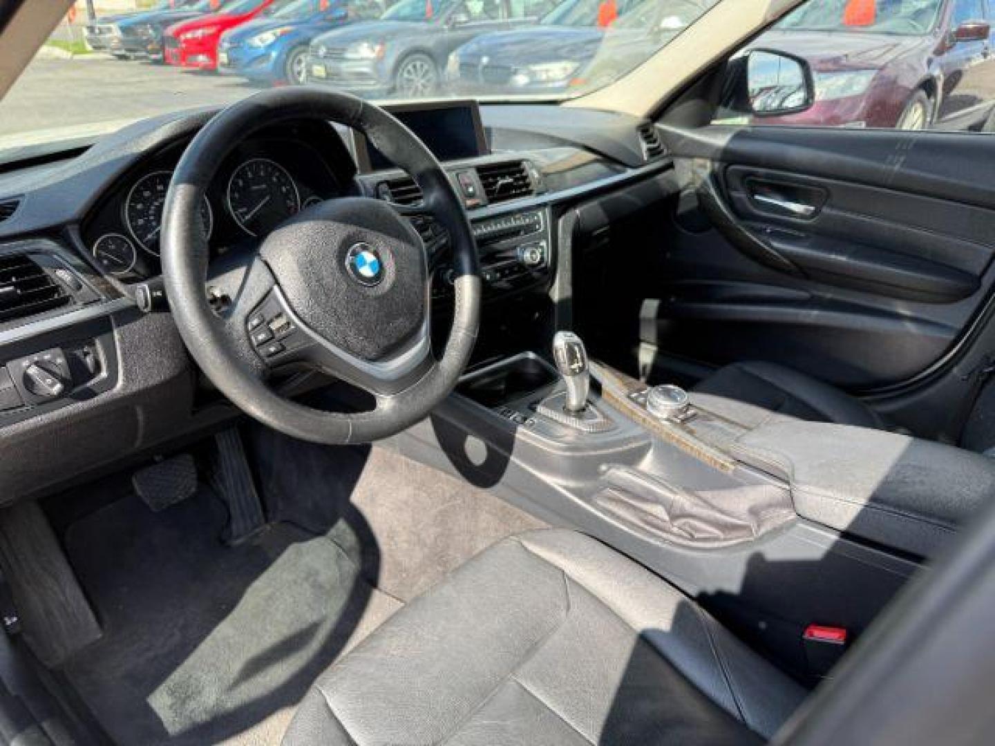 2014 Alpine White /Black BMW 320i xDrive (WBA3C3C51EF) with an 2L I-4 gasoline direct injection engine, AUTOMATIC transmission, located at 1235 N Woodruff Ave., Idaho Falls, 83401, (208) 523-1053, 43.507172, -112.000488 - At Timberline Auto, finding a great deal on your next vehicle is always easy! Our experienced sales staff's goal is to help find you the right vehicle at the right price! Our knowledgeable finance department has options for almost any credit score. We offer extended service contract options to prote - Photo#9