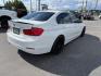 2014 Alpine White /Black BMW 320i xDrive (WBA3C3C51EF) with an 2L I-4 gasoline direct injection engine, AUTOMATIC transmission, located at 1235 N Woodruff Ave., Idaho Falls, 83401, (208) 523-1053, 43.507172, -112.000488 - At Timberline Auto, finding a great deal on your next vehicle is always easy! Our experienced sales staff's goal is to help find you the right vehicle at the right price! Our knowledgeable finance department has options for almost any credit score. We offer extended service contract options to prote - Photo#4