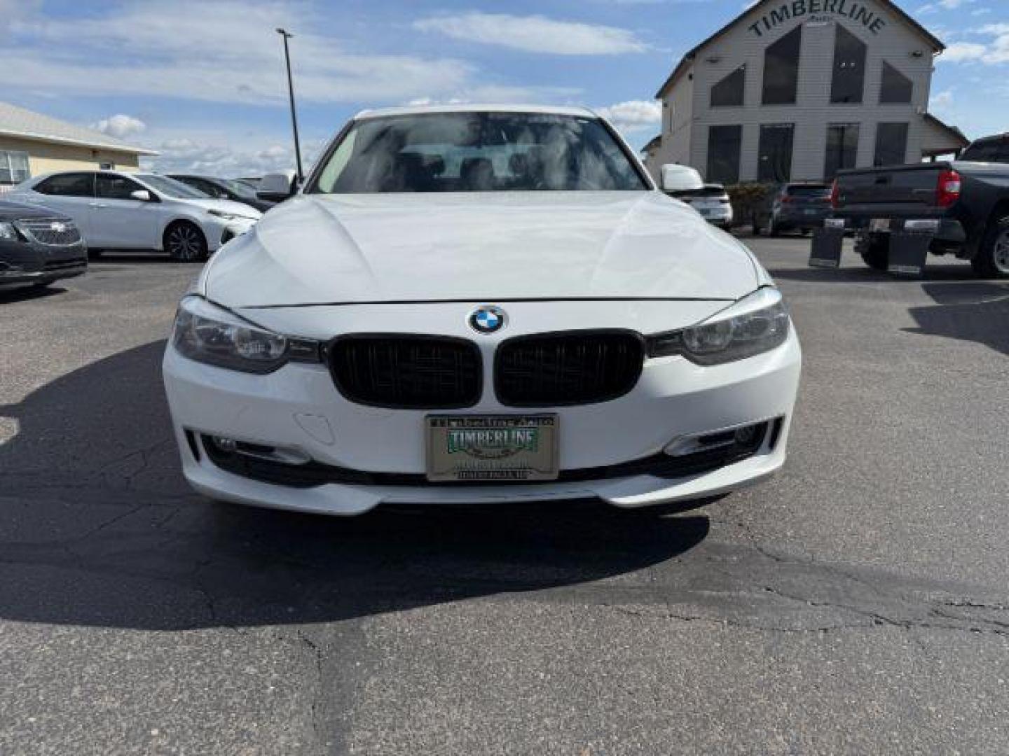 2014 Alpine White /Black BMW 320i xDrive (WBA3C3C51EF) with an 2L I-4 gasoline direct injection engine, AUTOMATIC transmission, located at 1235 N Woodruff Ave., Idaho Falls, 83401, (208) 523-1053, 43.507172, -112.000488 - At Timberline Auto, finding a great deal on your next vehicle is always easy! Our experienced sales staff's goal is to help find you the right vehicle at the right price! Our knowledgeable finance department has options for almost any credit score. We offer extended service contract options to prote - Photo#6