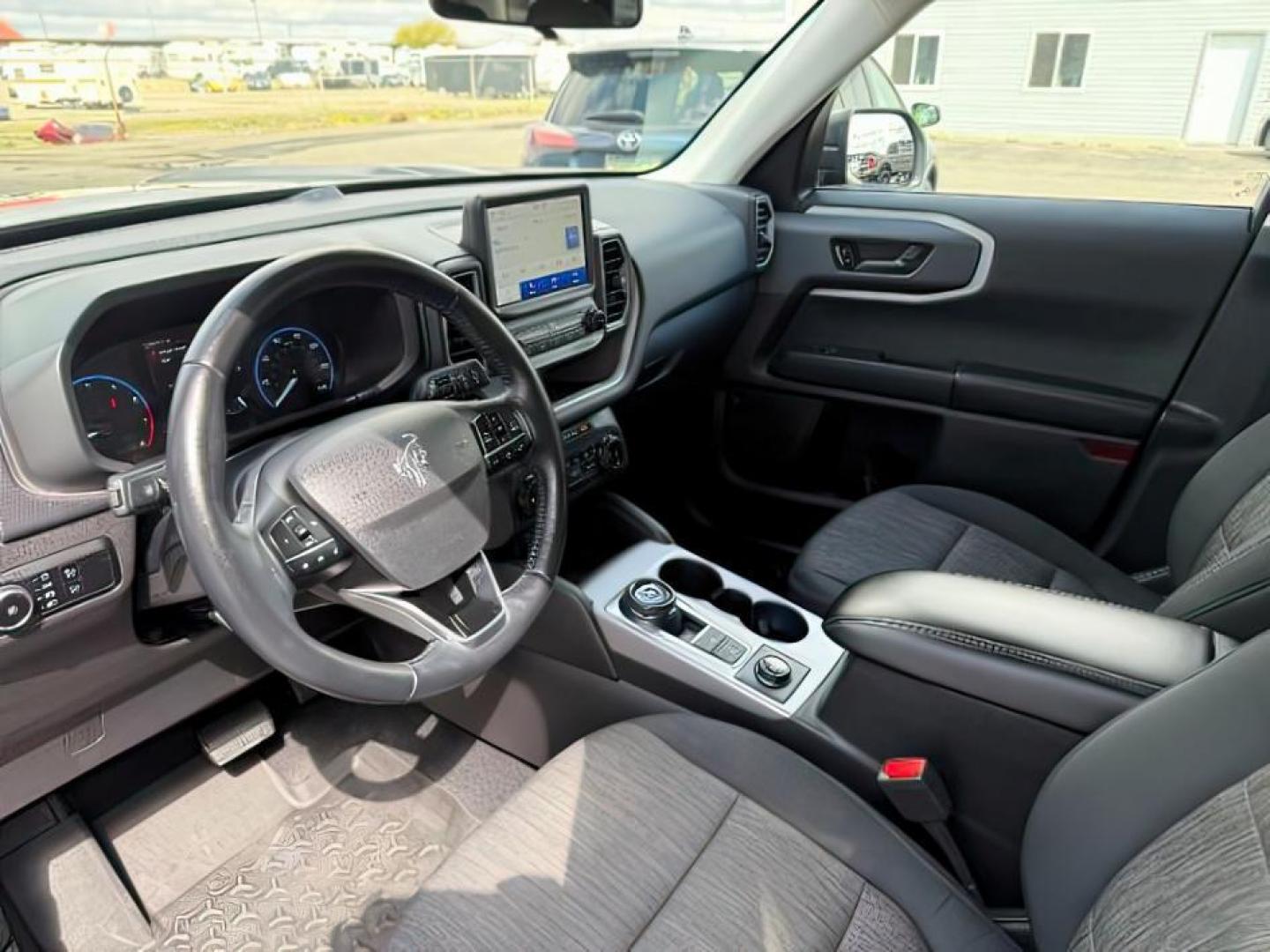 2023 BLUE /Ebony Ford Bronco Sport Big Bend (3FMCR9B64PR) with an EcoBoost 1.5L I-3 port/direct injection engine, AUTOMATIC transmission, located at 1235 N Woodruff Ave., Idaho Falls, 83401, (208) 523-1053, 43.507172, -112.000488 - At Timberline Auto, finding a great deal on your next vehicle is always easy! Our experienced sales staff's goal is to help find you the right vehicle at the right price! Our knowledgeable finance department has options for almost any credit score. We offer extended service contract options to prote - Photo#12