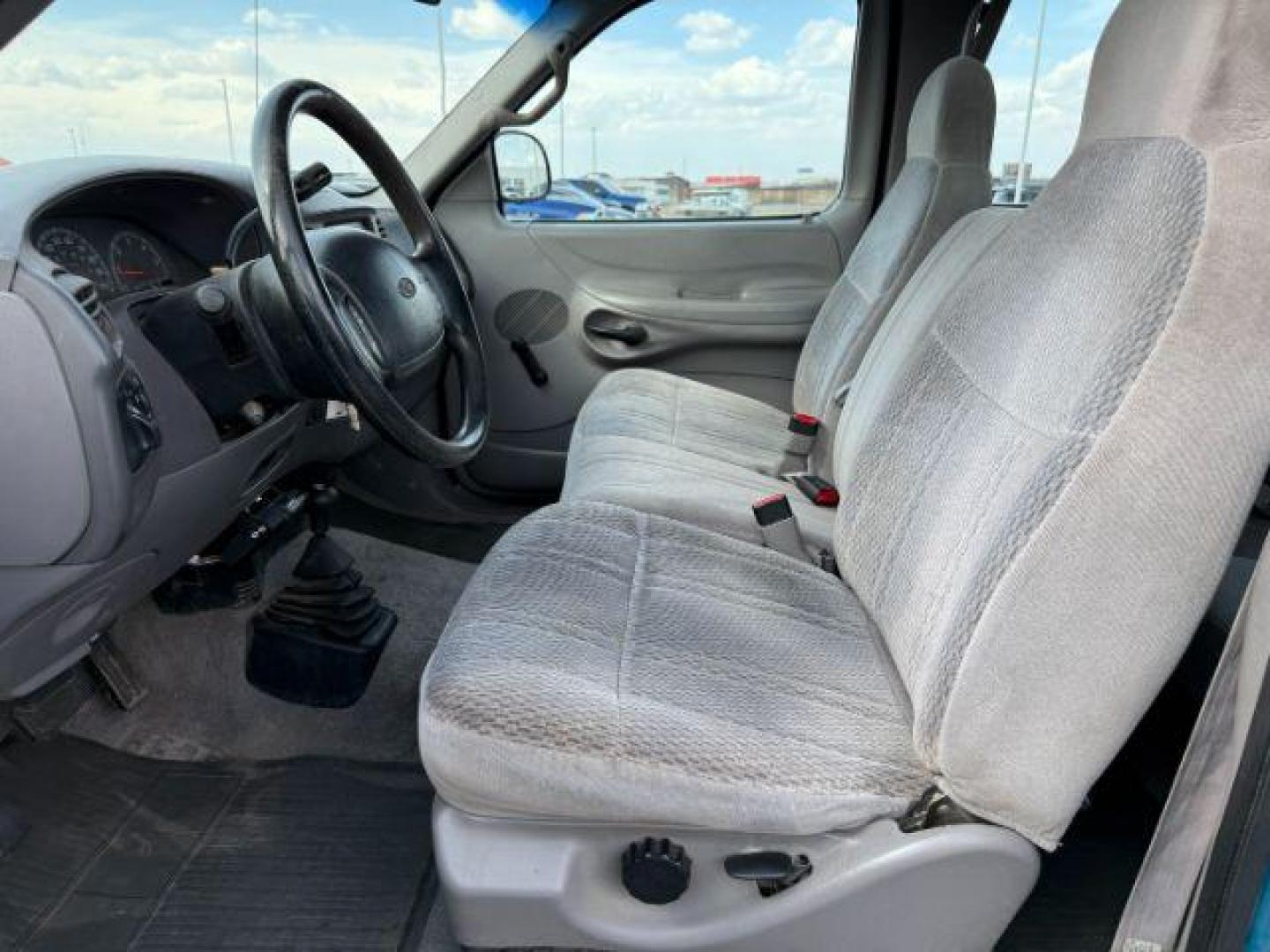 1997 BLUE /XLT Ford F-150 XLT (2FTDX18W1VC) with an 4.6 engine, AUTOMATIC transmission, located at 1235 N Woodruff Ave., Idaho Falls, 83401, (208) 523-1053, 43.507172, -112.000488 - At Timberline Auto, finding a great deal on your next vehicle is always easy! Our experienced sales staff's goal is to help find you the right vehicle at the right price! Our knowledgeable finance department has options for almost any credit score. We offer extended service contract options to prote - Photo#9