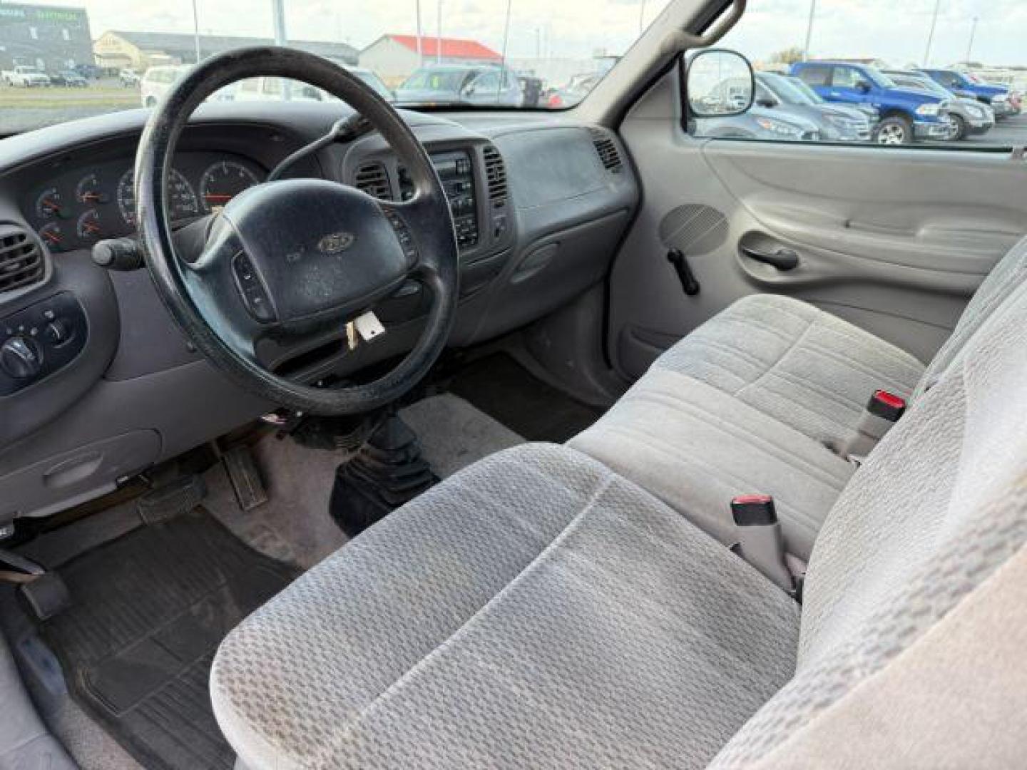 1997 BLUE /XLT Ford F-150 XLT (2FTDX18W1VC) with an 4.6 engine, AUTOMATIC transmission, located at 1235 N Woodruff Ave., Idaho Falls, 83401, (208) 523-1053, 43.507172, -112.000488 - At Timberline Auto, finding a great deal on your next vehicle is always easy! Our experienced sales staff's goal is to help find you the right vehicle at the right price! Our knowledgeable finance department has options for almost any credit score. We offer extended service contract options to prote - Photo#10