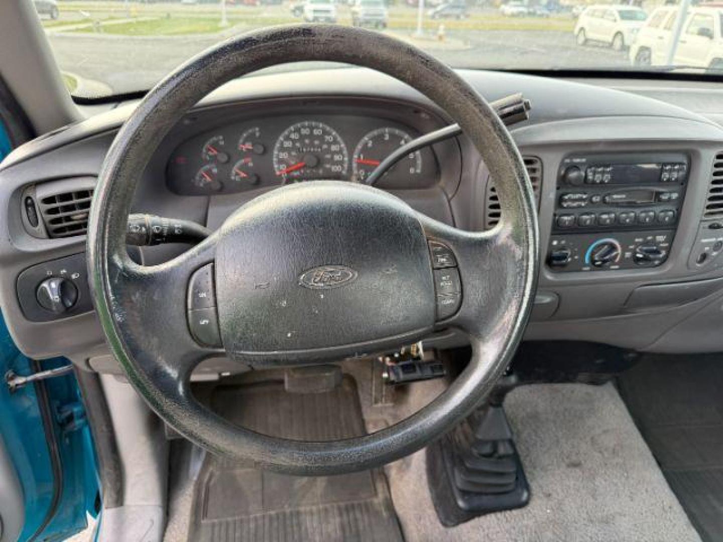 1997 BLUE /XLT Ford F-150 XLT (2FTDX18W1VC) with an 4.6 engine, AUTOMATIC transmission, located at 1235 N Woodruff Ave., Idaho Falls, 83401, (208) 523-1053, 43.507172, -112.000488 - At Timberline Auto, finding a great deal on your next vehicle is always easy! Our experienced sales staff's goal is to help find you the right vehicle at the right price! Our knowledgeable finance department has options for almost any credit score. We offer extended service contract options to prote - Photo#11