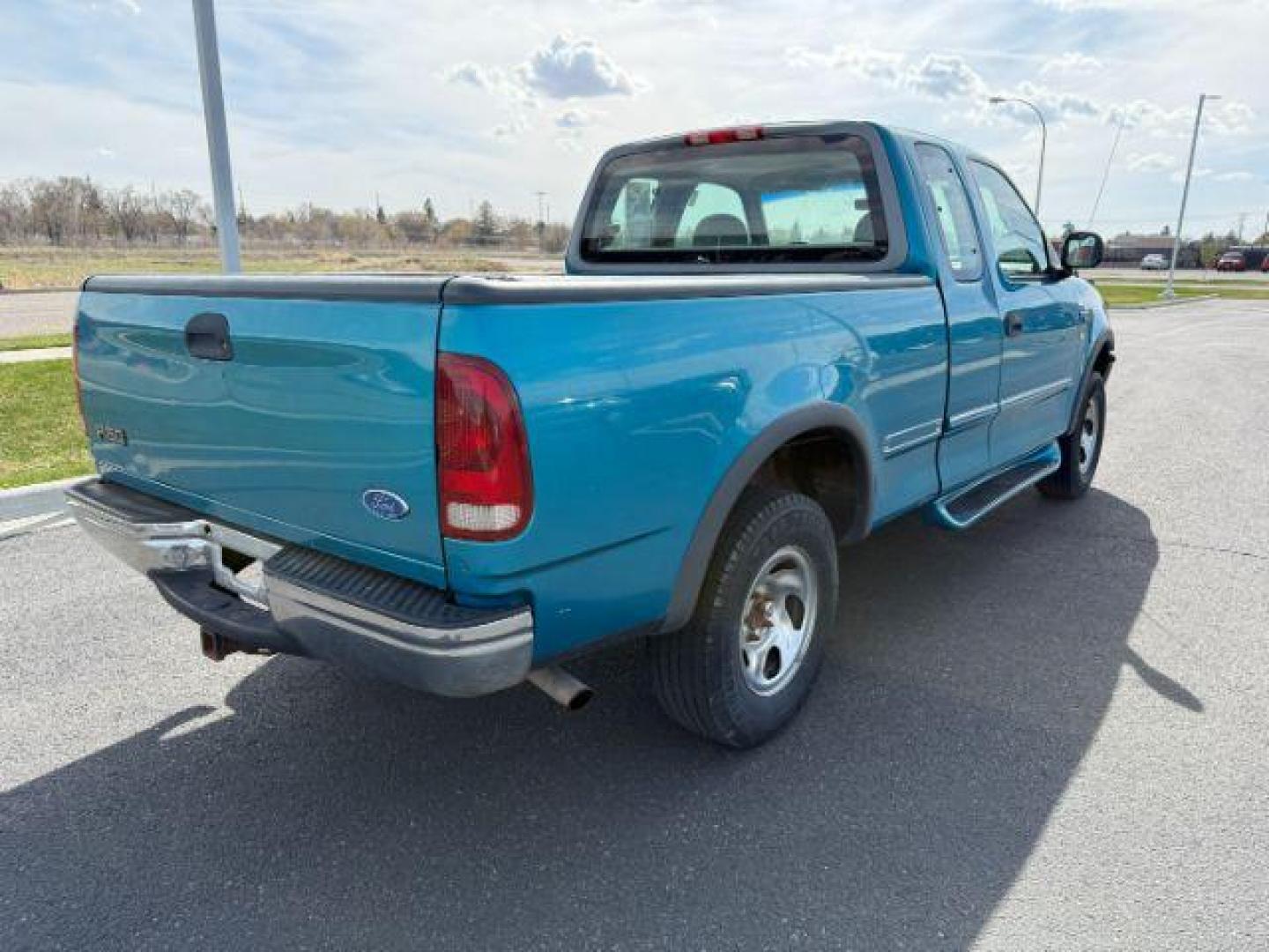 1997 BLUE /XLT Ford F-150 XLT (2FTDX18W1VC) with an 4.6 engine, AUTOMATIC transmission, located at 1235 N Woodruff Ave., Idaho Falls, 83401, (208) 523-1053, 43.507172, -112.000488 - At Timberline Auto, finding a great deal on your next vehicle is always easy! Our experienced sales staff's goal is to help find you the right vehicle at the right price! Our knowledgeable finance department has options for almost any credit score. We offer extended service contract options to prote - Photo#4