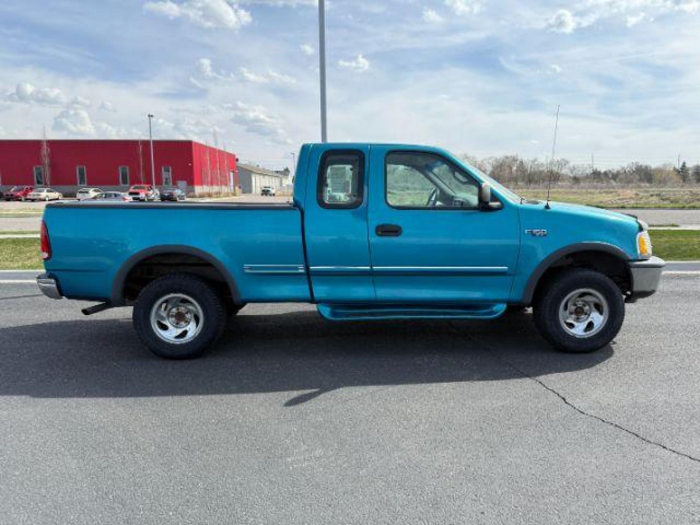 1997 BLUE /XLT Ford F-150 XLT (2FTDX18W1VC) with an 4.6 engine, AUTOMATIC transmission, located at 1235 N Woodruff Ave., Idaho Falls, 83401, (208) 523-1053, 43.507172, -112.000488 - At Timberline Auto, finding a great deal on your next vehicle is always easy! Our experienced sales staff's goal is to help find you the right vehicle at the right price! Our knowledgeable finance department has options for almost any credit score. We offer extended service contract options to prote - Photo#5