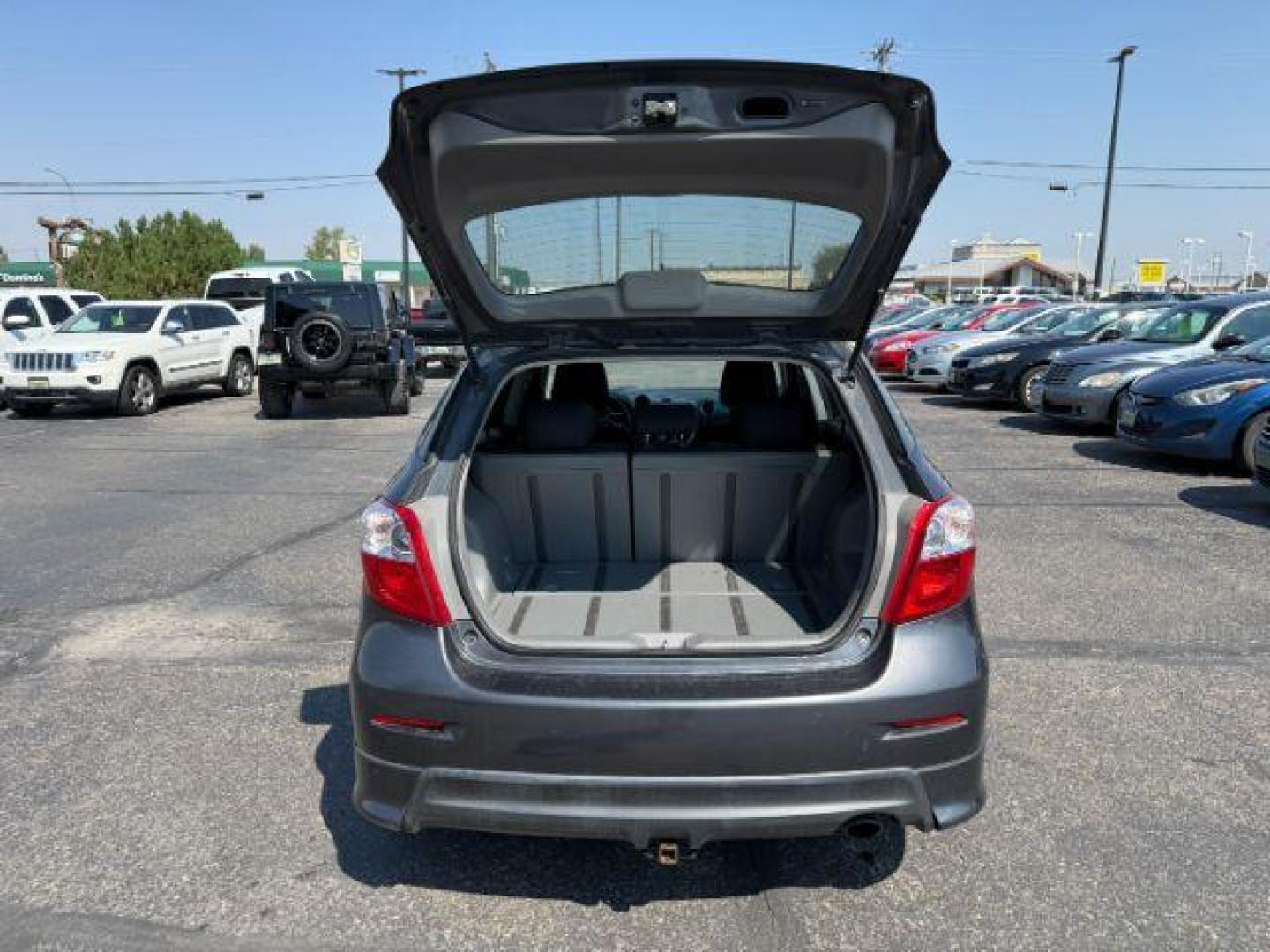 2009 Magnetic Gray Metallic /Dark Charcoal Toyota Matrix (2T1LE40E49C) with an 24L I-4 DOHC engine, Automatic transmission, located at 1175 N Woodruff Ave, Idaho Falls, ID, 83401, 43.506901, -111.999657 - At Timberline Auto, finding a great deal on your next vehicle is always easy! Our experienced sales staff's goal is to help find you the right vehicle at the right price! Our knowledgeable finance department has options for almost any credit score. We offer extended service contract options to prote - Photo#24