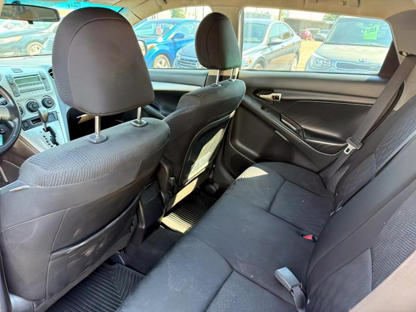 2009 Magnetic Gray Metallic /Dark Charcoal Toyota Matrix (2T1LE40E49C) with an 24L I-4 DOHC engine, Automatic transmission, located at 1175 N Woodruff Ave, Idaho Falls, ID, 83401, 43.506901, -111.999657 - At Timberline Auto, finding a great deal on your next vehicle is always easy! Our experienced sales staff's goal is to help find you the right vehicle at the right price! Our knowledgeable finance department has options for almost any credit score. We offer extended service contract options to prote - Photo#18