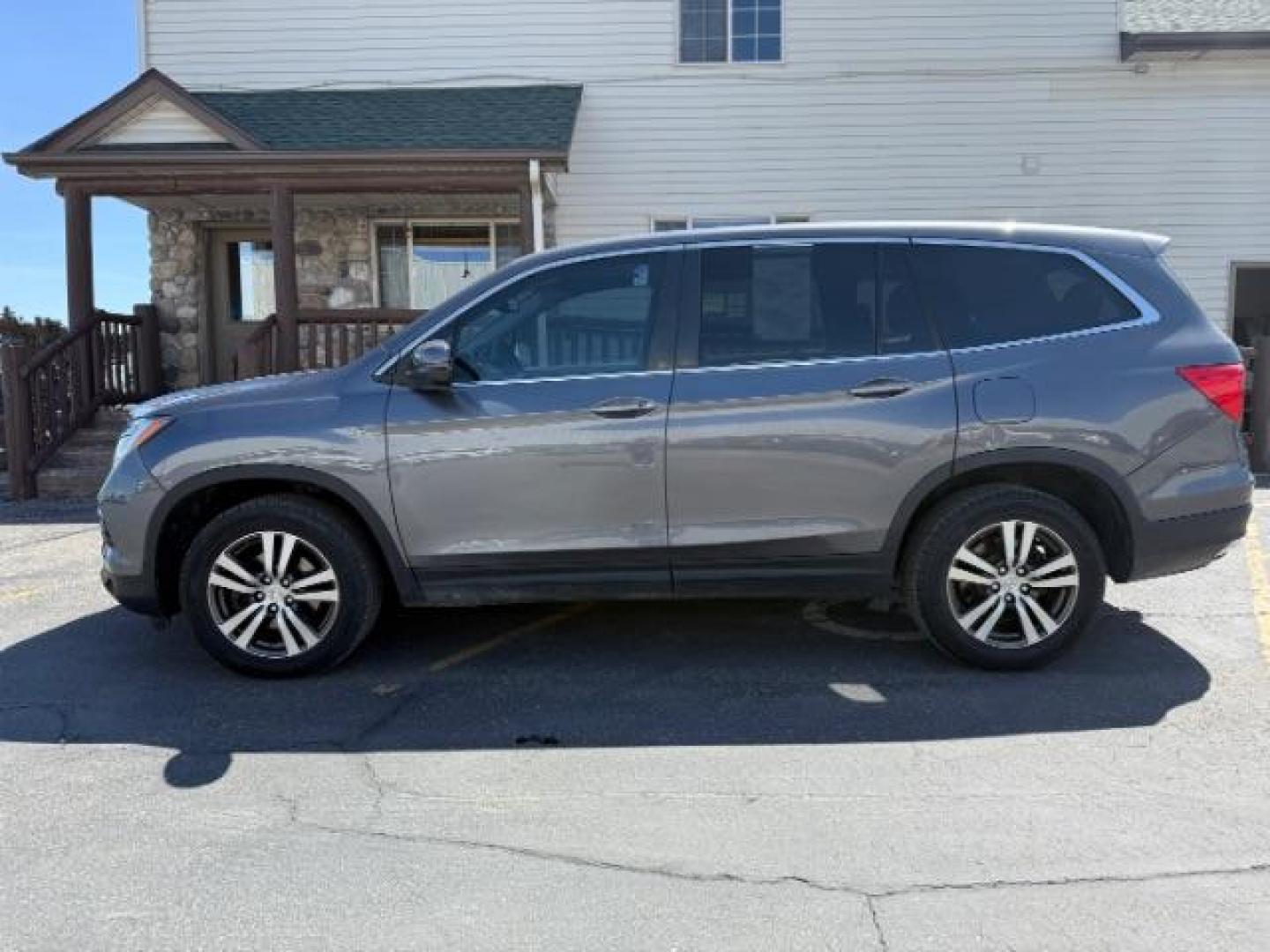 2018 GREY /Black Honda Pilot EX-L (5FNYF6H55JB) with an 3.5L V-6 gasoline direct injection engine, AUTOMATIC transmission, located at 1235 N Woodruff Ave., Idaho Falls, 83401, (208) 523-1053, 43.507172, -112.000488 - At Timberline Auto, finding a great deal on your next vehicle is always easy! Our experienced sales staff's goal is to help find you the right vehicle at the right price! Our knowledgeable finance department has options for almost any credit score. We offer extended service contract options to prote - Photo#1