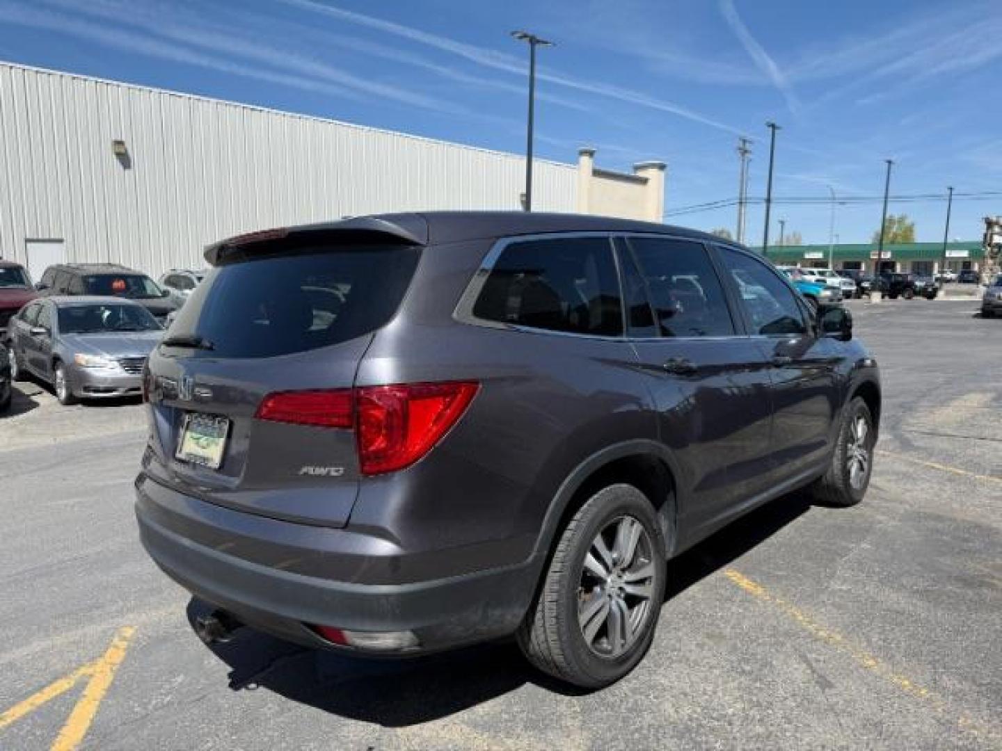 2018 GREY /Black Honda Pilot EX-L (5FNYF6H55JB) with an 3.5L V-6 gasoline direct injection engine, AUTOMATIC transmission, located at 1235 N Woodruff Ave., Idaho Falls, 83401, (208) 523-1053, 43.507172, -112.000488 - At Timberline Auto, finding a great deal on your next vehicle is always easy! Our experienced sales staff's goal is to help find you the right vehicle at the right price! Our knowledgeable finance department has options for almost any credit score. We offer extended service contract options to prote - Photo#4