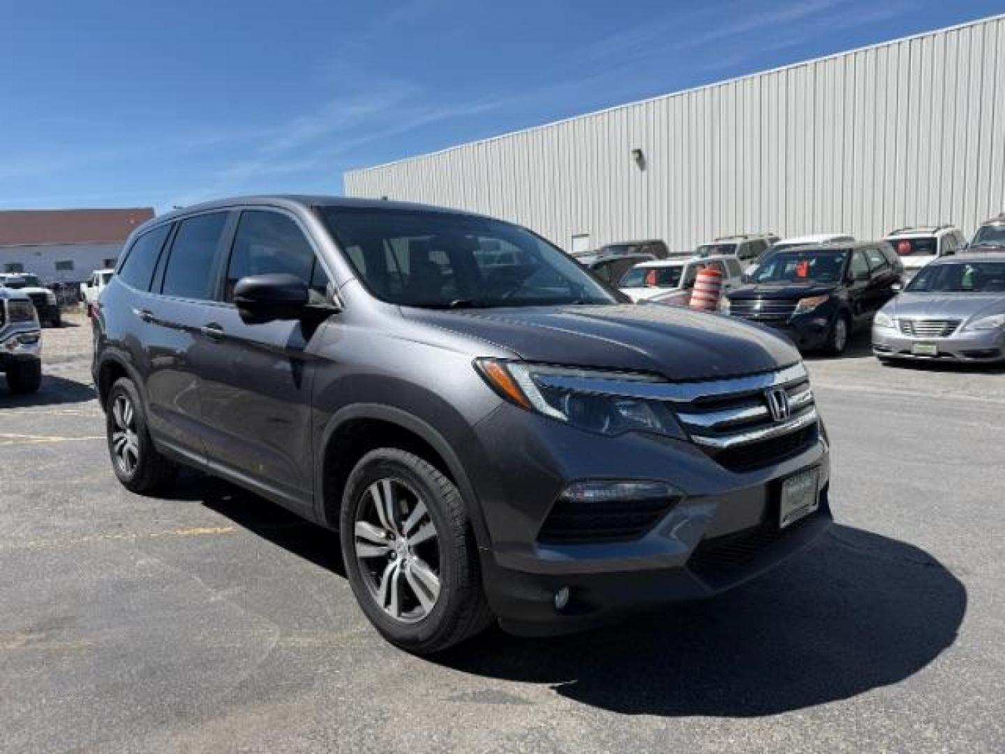 2018 GREY /Black Honda Pilot EX-L (5FNYF6H55JB) with an 3.5L V-6 gasoline direct injection engine, AUTOMATIC transmission, located at 1235 N Woodruff Ave., Idaho Falls, 83401, (208) 523-1053, 43.507172, -112.000488 - At Timberline Auto, finding a great deal on your next vehicle is always easy! Our experienced sales staff's goal is to help find you the right vehicle at the right price! Our knowledgeable finance department has options for almost any credit score. We offer extended service contract options to prote - Photo#5