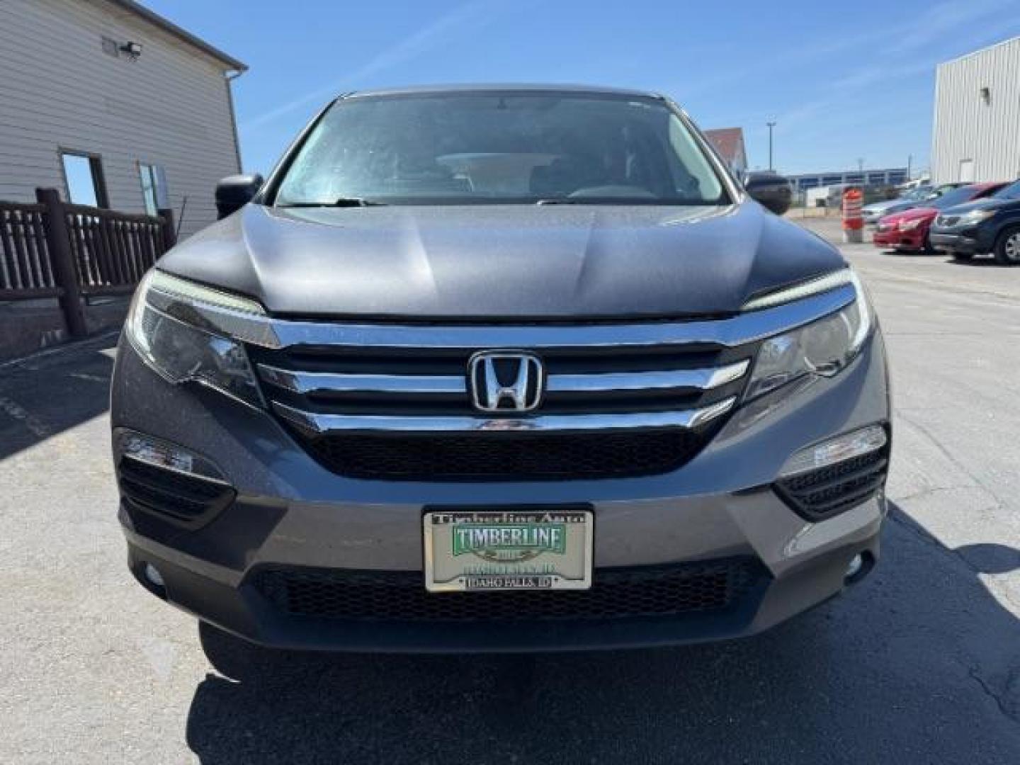 2018 GREY /Black Honda Pilot EX-L (5FNYF6H55JB) with an 3.5L V-6 gasoline direct injection engine, AUTOMATIC transmission, located at 1235 N Woodruff Ave., Idaho Falls, 83401, (208) 523-1053, 43.507172, -112.000488 - At Timberline Auto, finding a great deal on your next vehicle is always easy! Our experienced sales staff's goal is to help find you the right vehicle at the right price! Our knowledgeable finance department has options for almost any credit score. We offer extended service contract options to prote - Photo#6