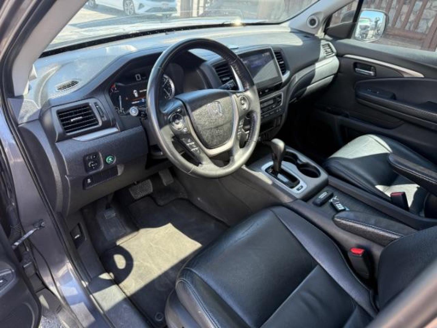 2018 GREY /Black Honda Pilot EX-L (5FNYF6H55JB) with an 3.5L V-6 gasoline direct injection engine, AUTOMATIC transmission, located at 1235 N Woodruff Ave., Idaho Falls, 83401, (208) 523-1053, 43.507172, -112.000488 - At Timberline Auto, finding a great deal on your next vehicle is always easy! Our experienced sales staff's goal is to help find you the right vehicle at the right price! Our knowledgeable finance department has options for almost any credit score. We offer extended service contract options to prote - Photo#11